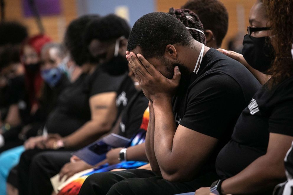 PHOTO: Family members mourn the death of Conrad Coleman Jr. following his funeral service on July 03, 2020, in New Rochelle, New York. Coleman, 39, died of COVID-19 on June 20, 2020.