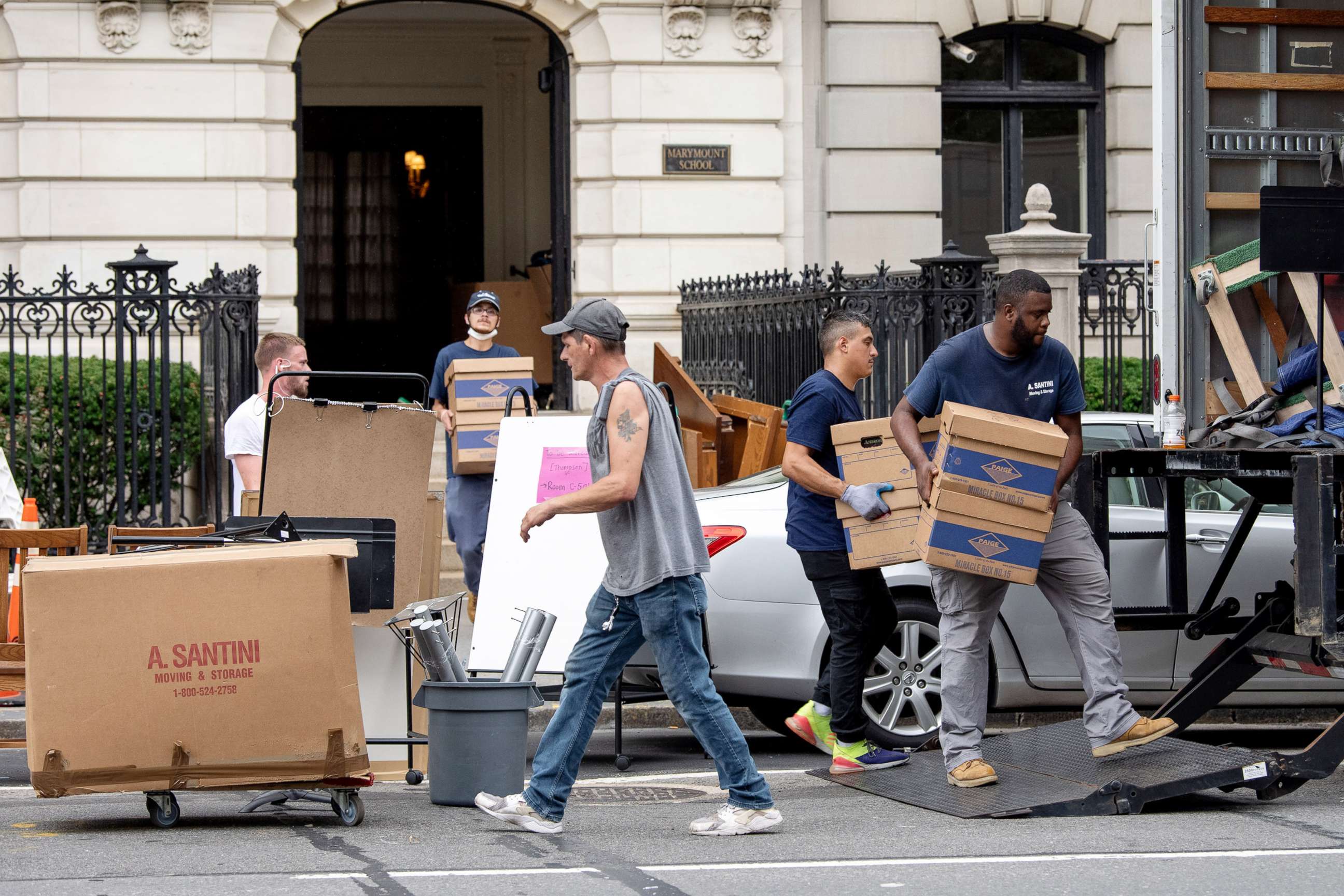 PHOTO: People carry boxes to a moving truck on the Upper East Side, as the city of New York continues Phase 4 of re-opening following restrictions imposed to slow the spread of Coronavirus on Aug. 29, 2020.  