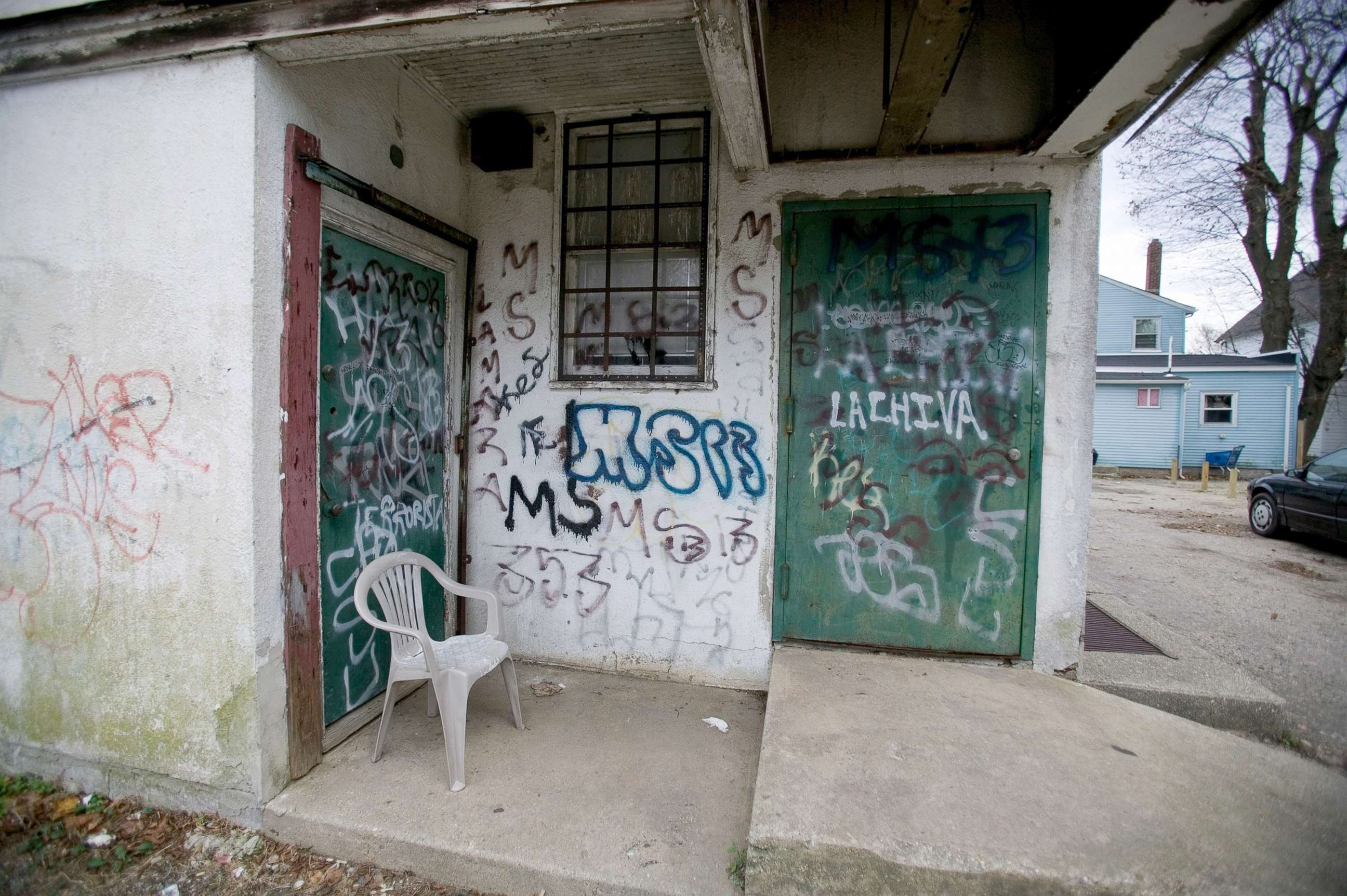 PHOTO: Graffiti painted by MS-13, a violent Central American street gang adorns a building in Central Islip, New York, in Suffolk County, Dec. 1, 2005.