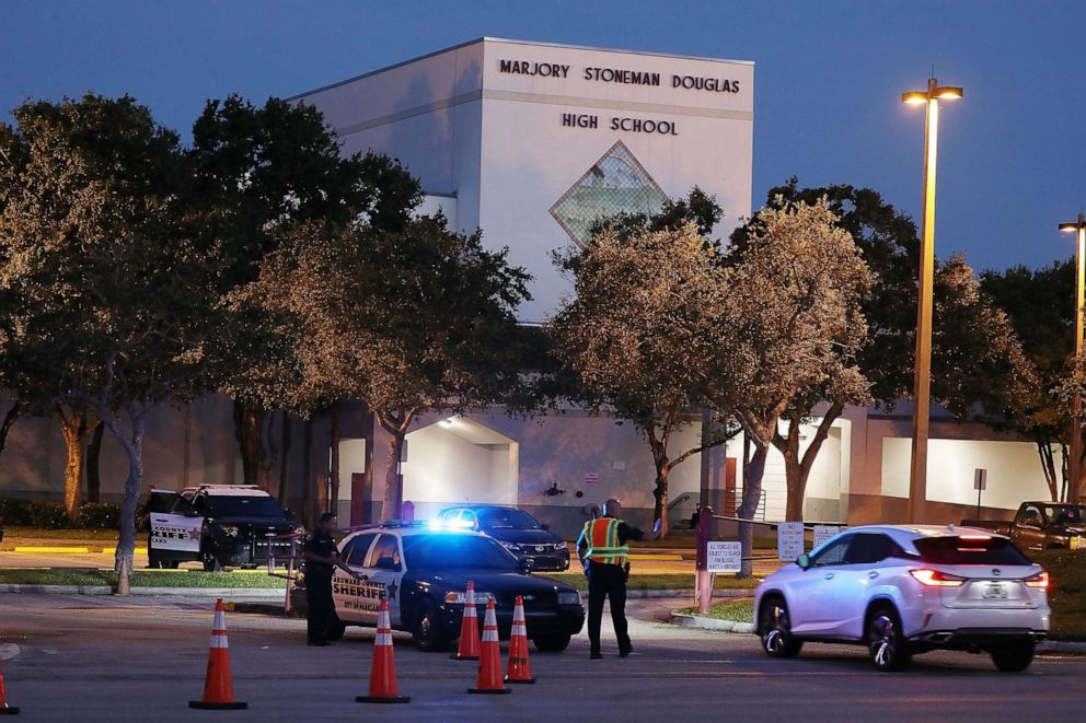 PHOTO: Police keep the campus secure as students arrive at Marjory Stoneman Douglas High School on the first day of school on Aug. 15, 2018, in Parkland, Fla.