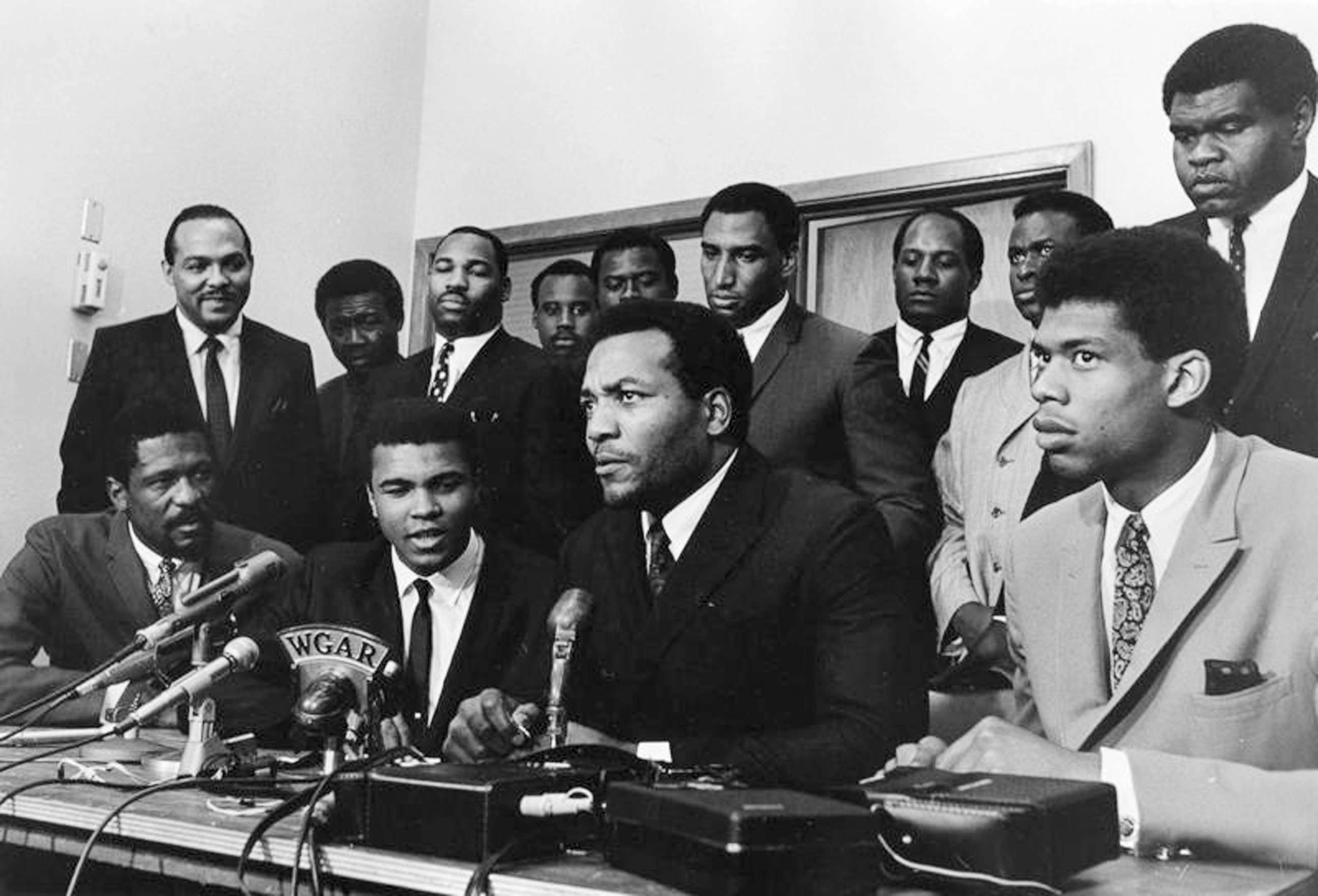 PHOTO: A group of top African American athletes from different sporting disciplines gather to give support and hear the boxer Muhammad Ali give his reasons for rejecting the draft during the Vietnam War in Cleveland, June 4, 1967. 