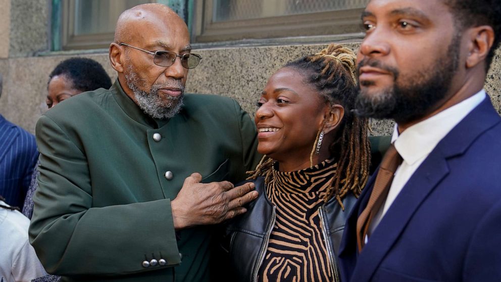 PHOTO: Muhammad Aziz, left, stands outside the courthouse with members of his family after his conviction in the killing of Malcolm X was vacated, Thursday, Nov. 18, 2021, in New York.