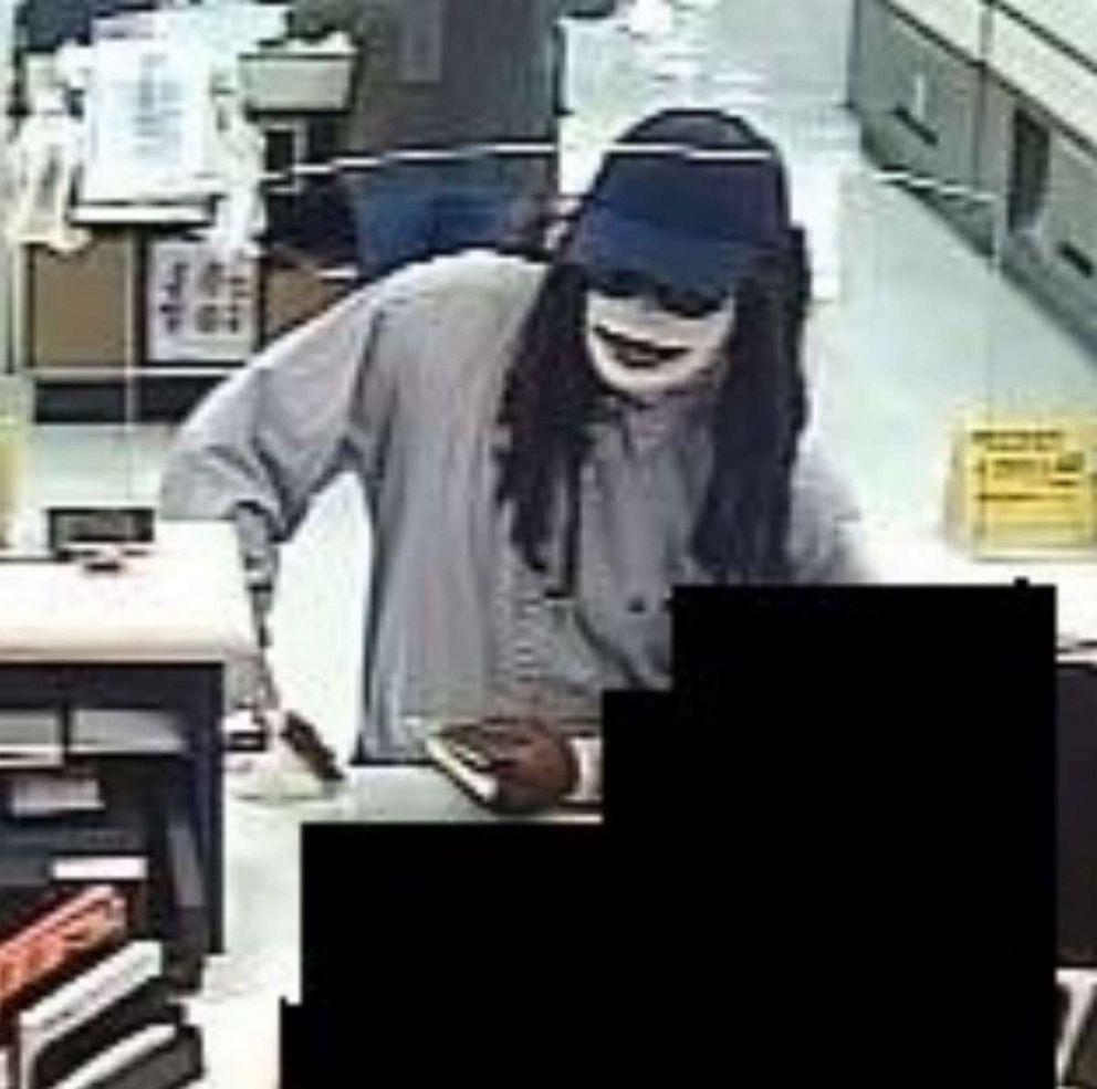 PHOTO: In this screen grab obtained by the FBI and posted to their Facebook account, a suspect is dressed like a mummy during a robbery.
