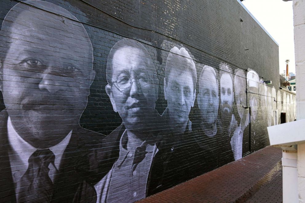 PHOTO: A mural depicting photos of American hostages around the world, created by the Bring Our Families Home Campaign, is seen in the Georgetown neighborhood of Washington, D.C., July 20, 2022.