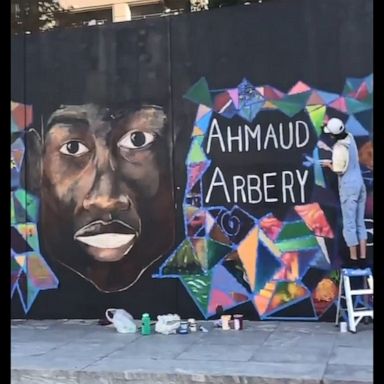 The mural features the names of George Floyd, Breonna Taylor and Ahmaud Arbery.