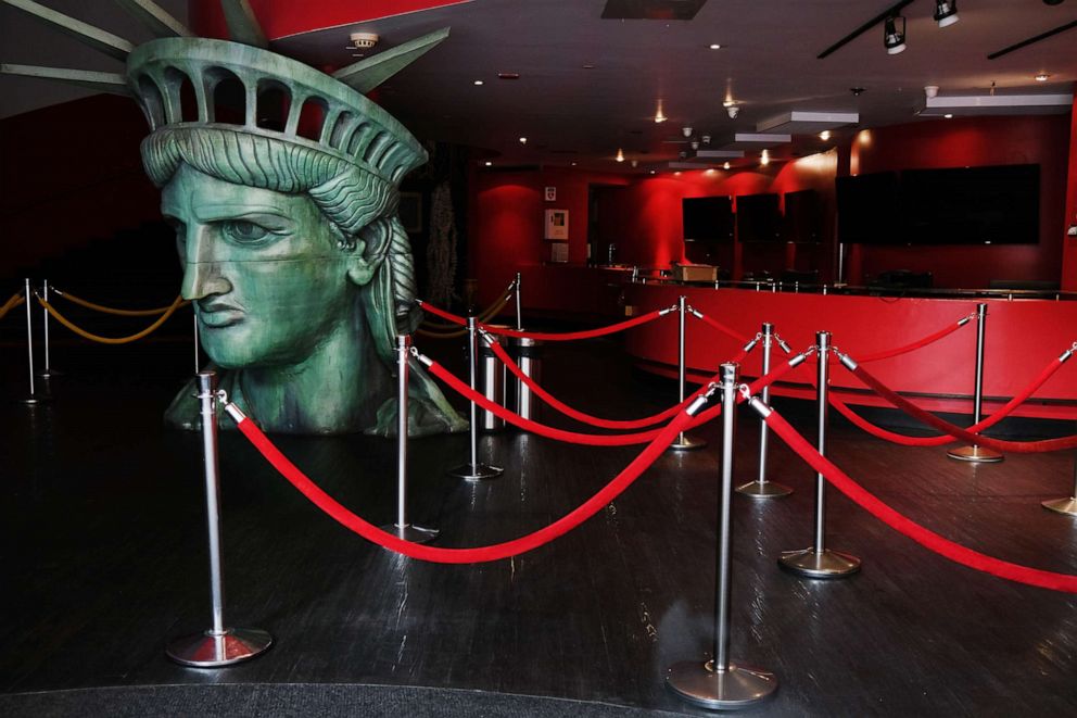 PHOTO: A replica of the head of the Statue of Liberty sits in the closed entrance Madame Tussauds museum along New York City's iconic 42nd Street on Aug. 6, 2020 in New York City.