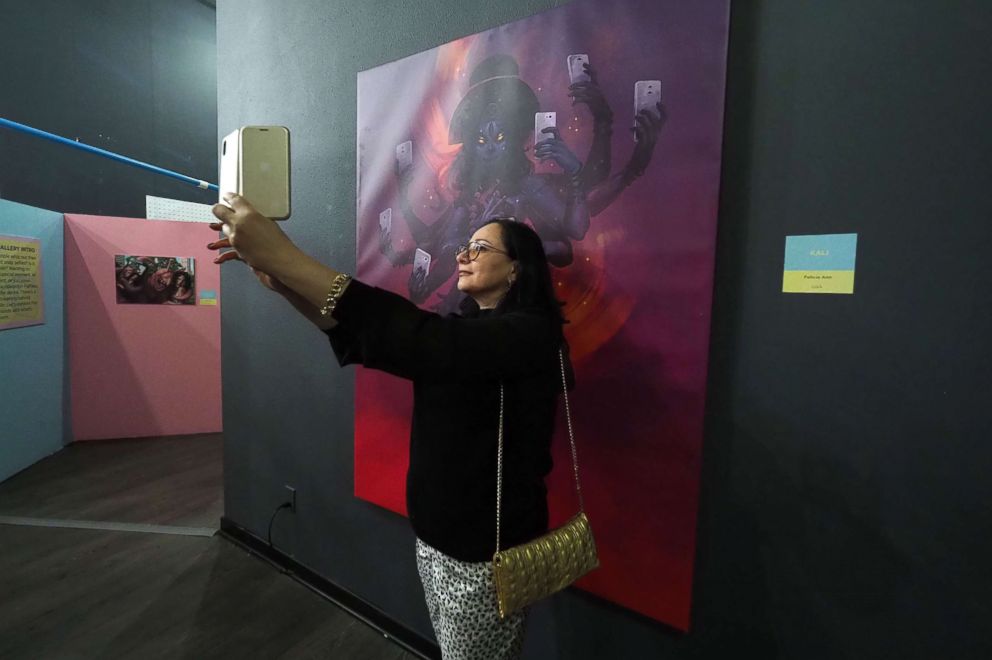 PHOTO: A visitor takes a selfie at the Museum of Selfies, in Glendale, Calif., March 29, 2018. 