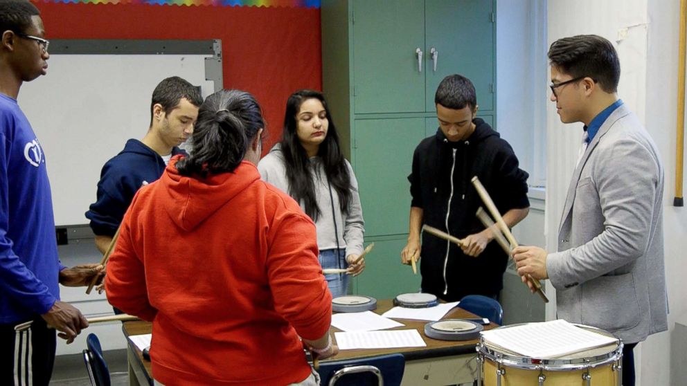 PHOTO: Brandon Ilaw gives a percussion lesson at Port Richmond High School in Staten Island, NY. 