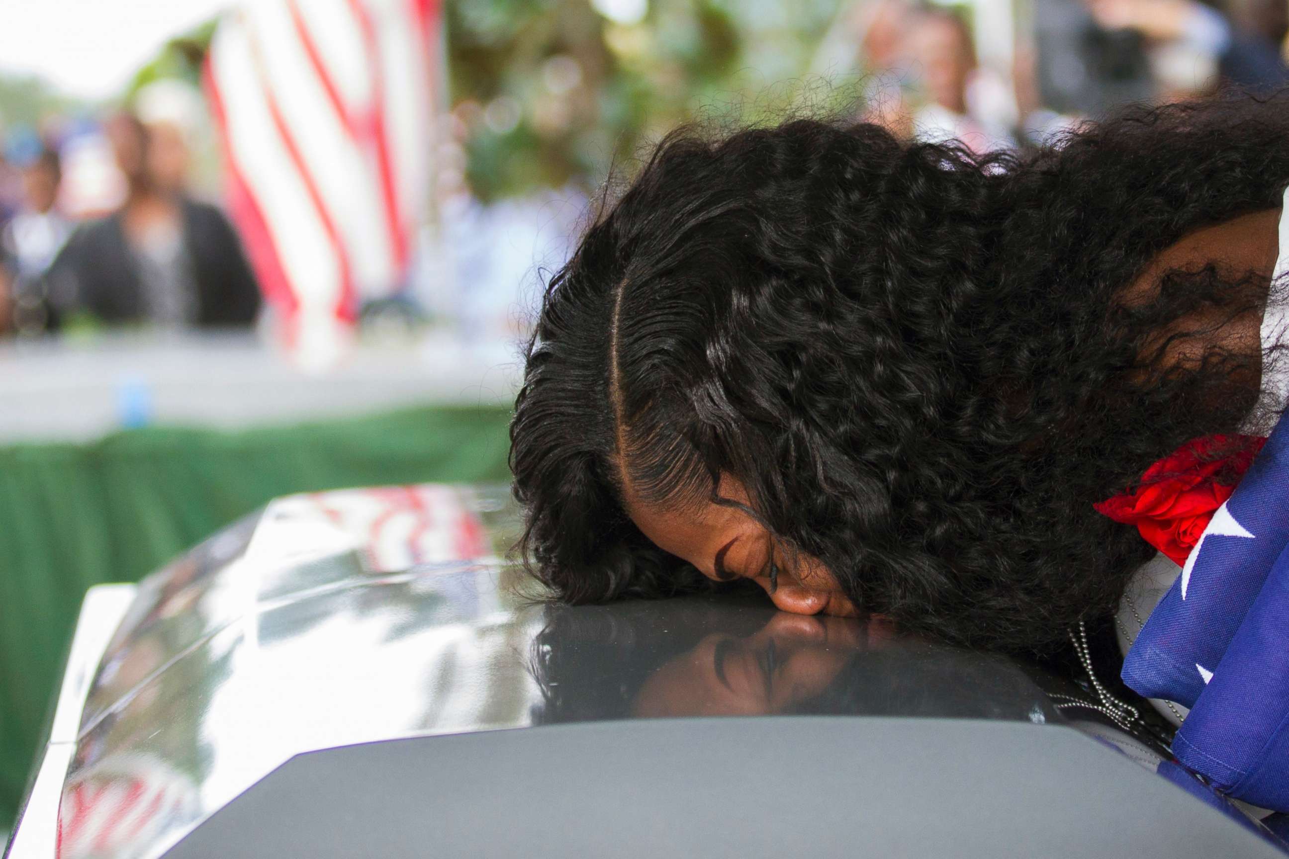 PHOTO: Myeshia Johnson kisses the casket of her husband, Sgt. La David Johnson, during his burial service at Fred Hunter's Hollywood Memorial Gardens, Oct. 21, 2017, in Hollywood, Fla. 
