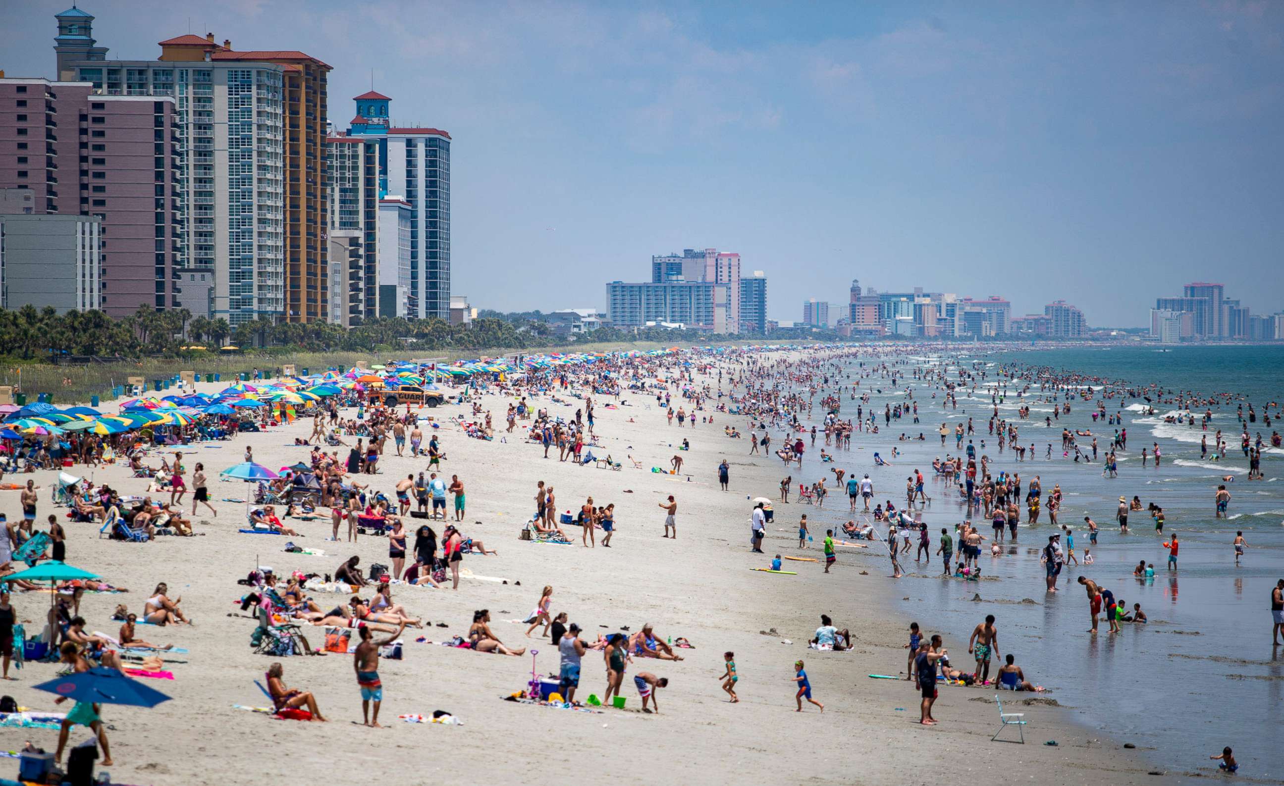 PHOTO: People fill the beach in North Myrtle Beach, S.C., July 4, 2020, as coronavirus cases continue to surge.
