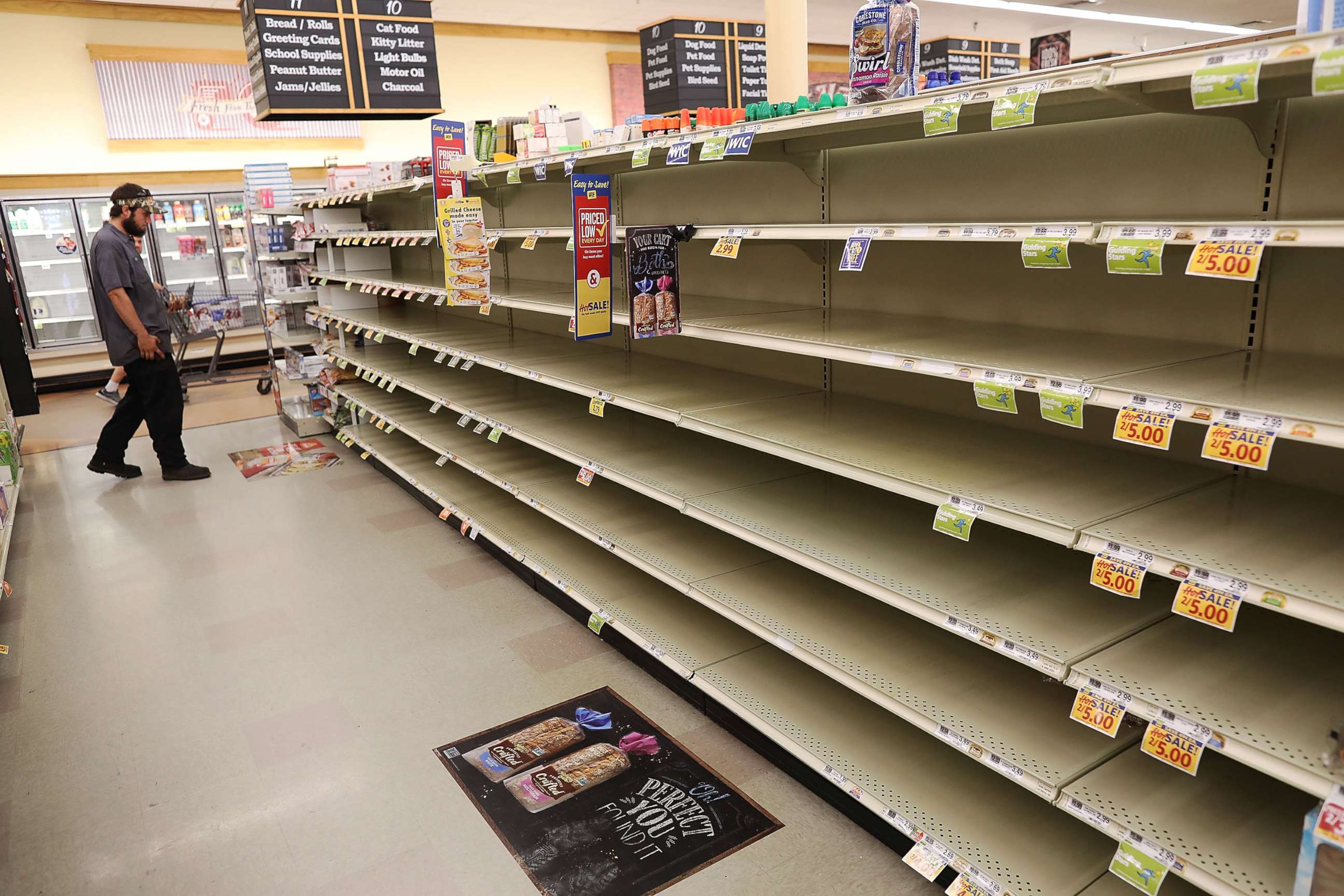 PHOTO: A store's bread shelves are bare as people stock up on food ahead of the arrival of Hurricane Florence on Sept. 11, 2018 in Myrtle Beach, South Carolina.