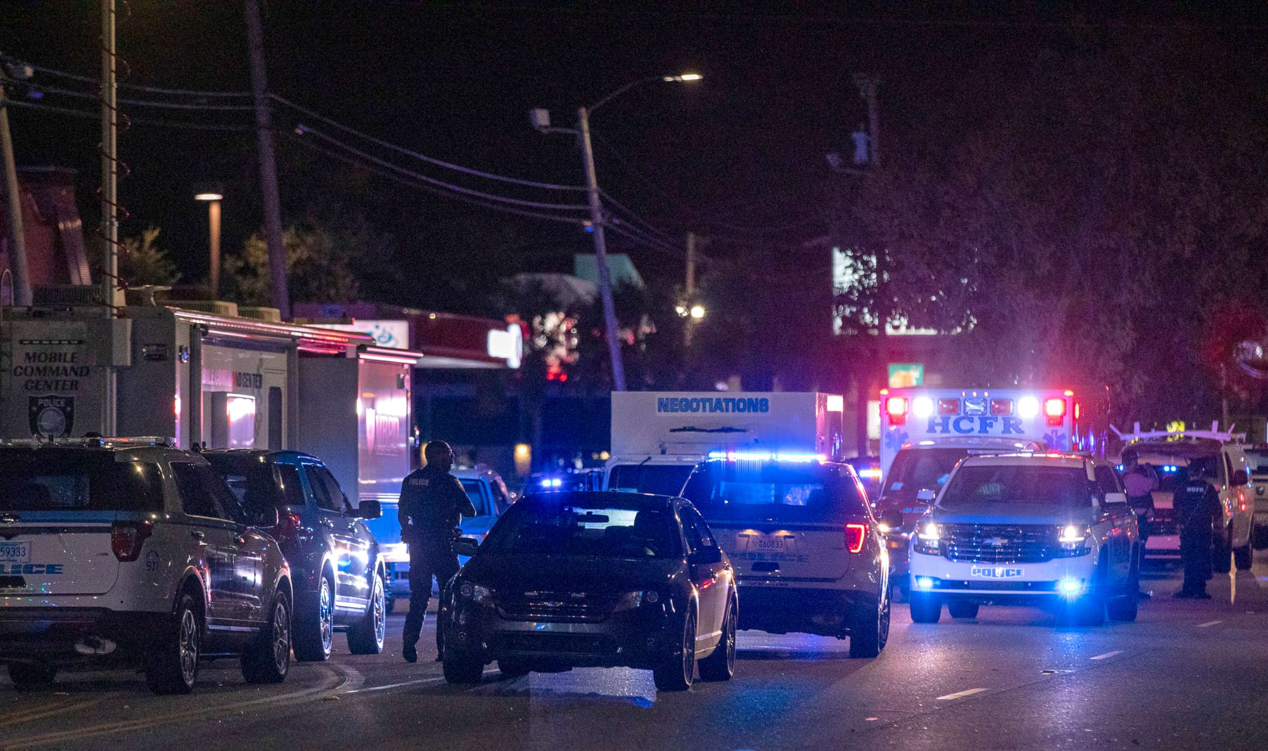 PHOTO: People gather near the site of a shooting in Myrtle Beach, S.C., Oct. 3, 2020.