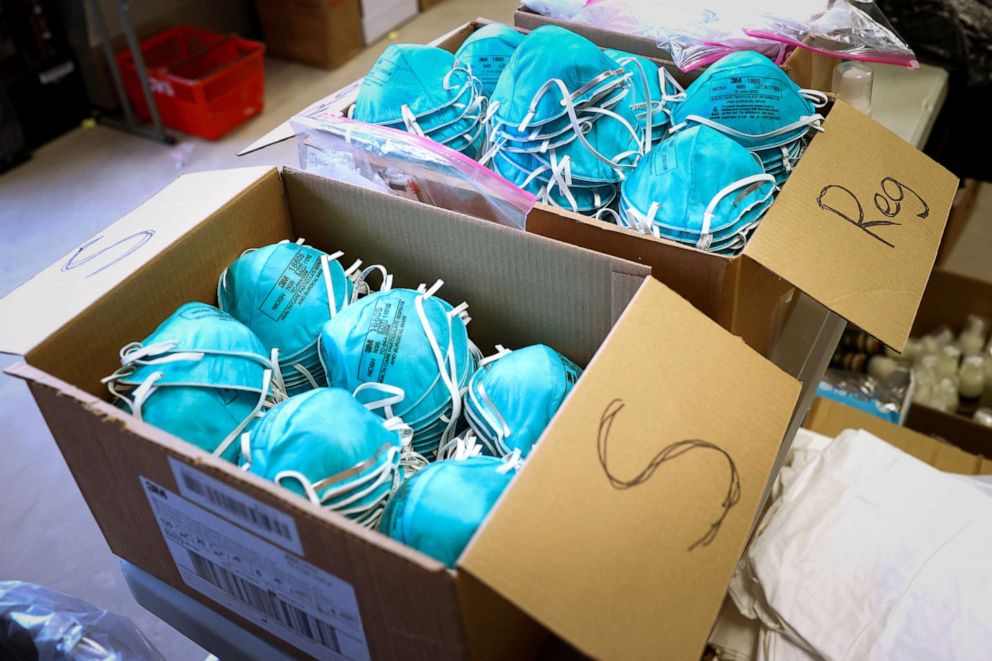 PHOTO: In this March 17, 2020, boxes of N95 protective masks for use by medical field personnel are seen in New York.