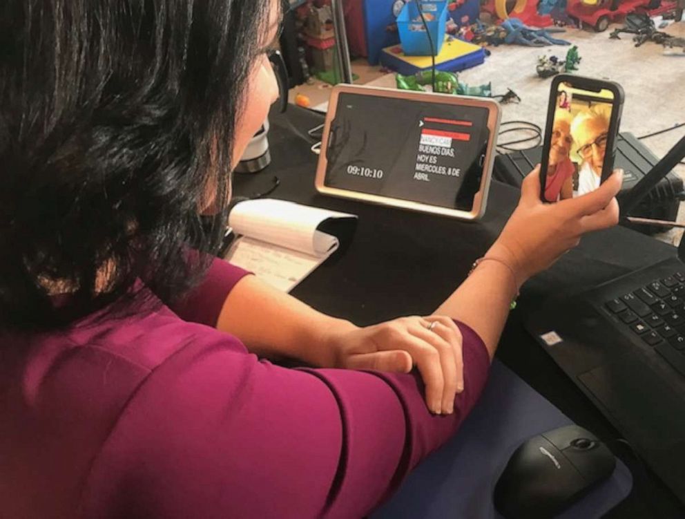 PHOTO: Nancy Alvarez meets via FaceTime with her "producers" from her makeshift TV studio as she works from home. 