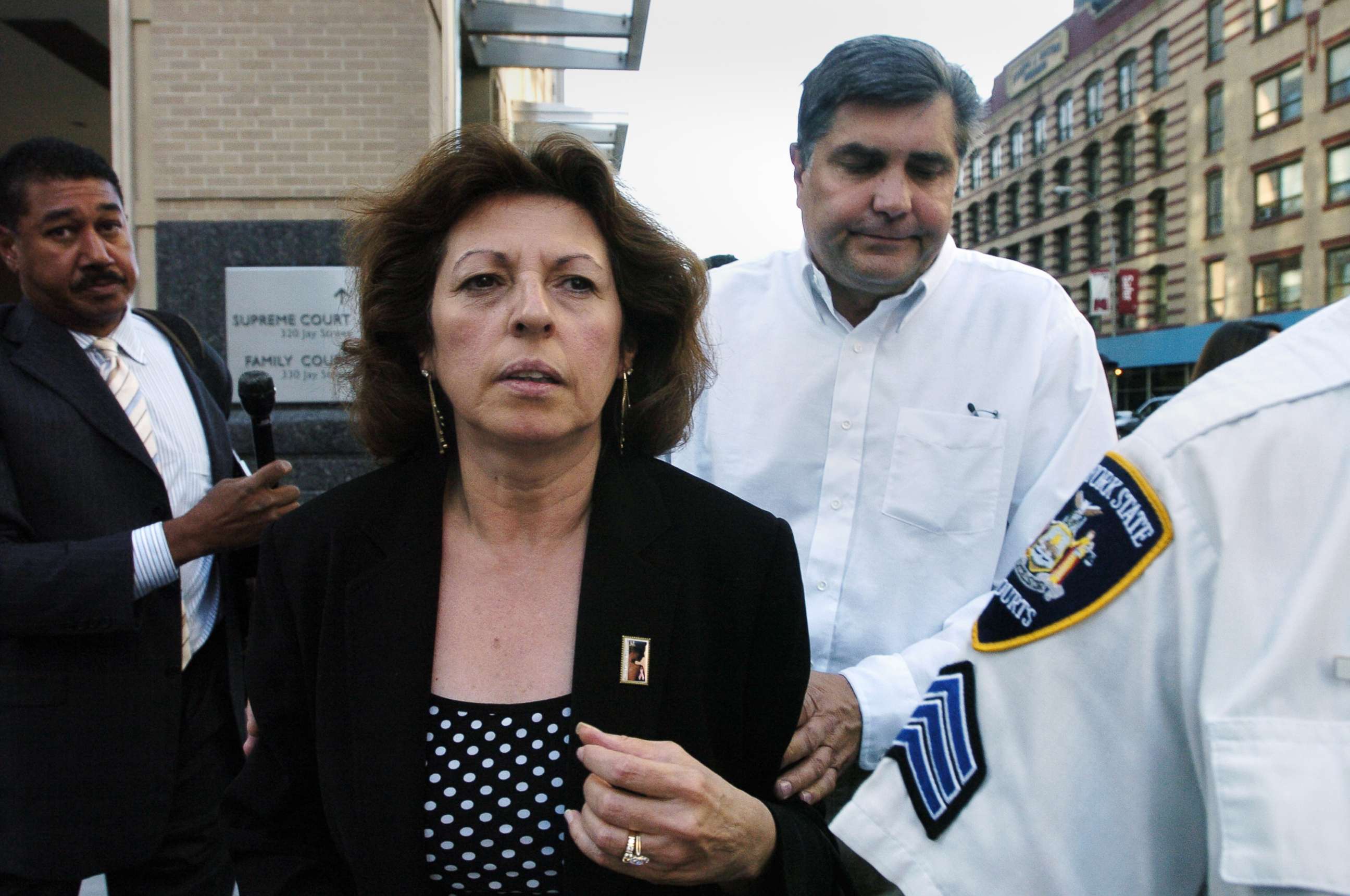 PHOTO: Nancy and Michael Fisher leave Brooklyn Supreme Court after John Guica, one of two men on trial for killing their son, Mark Fisher, was convicted of murder, robbery and weapons charges.