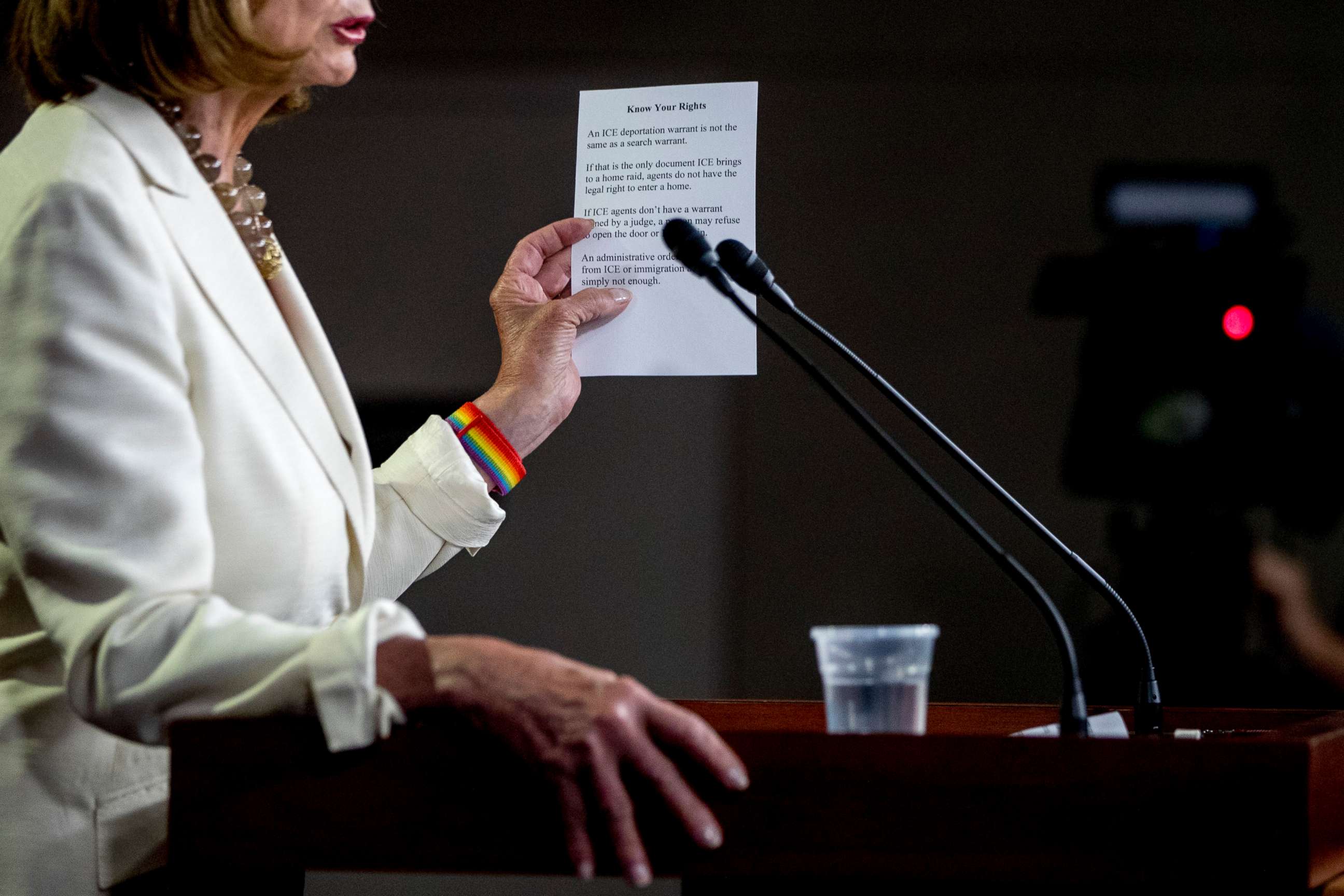 PHOTO: House Speaker Nancy Pelosi of Calif. reads from a paper titled "Know Your Rights" regarding ICE agents attempting to perform raids as she meets with reporters on Capitol Hill in Washington, July 11, 2019.