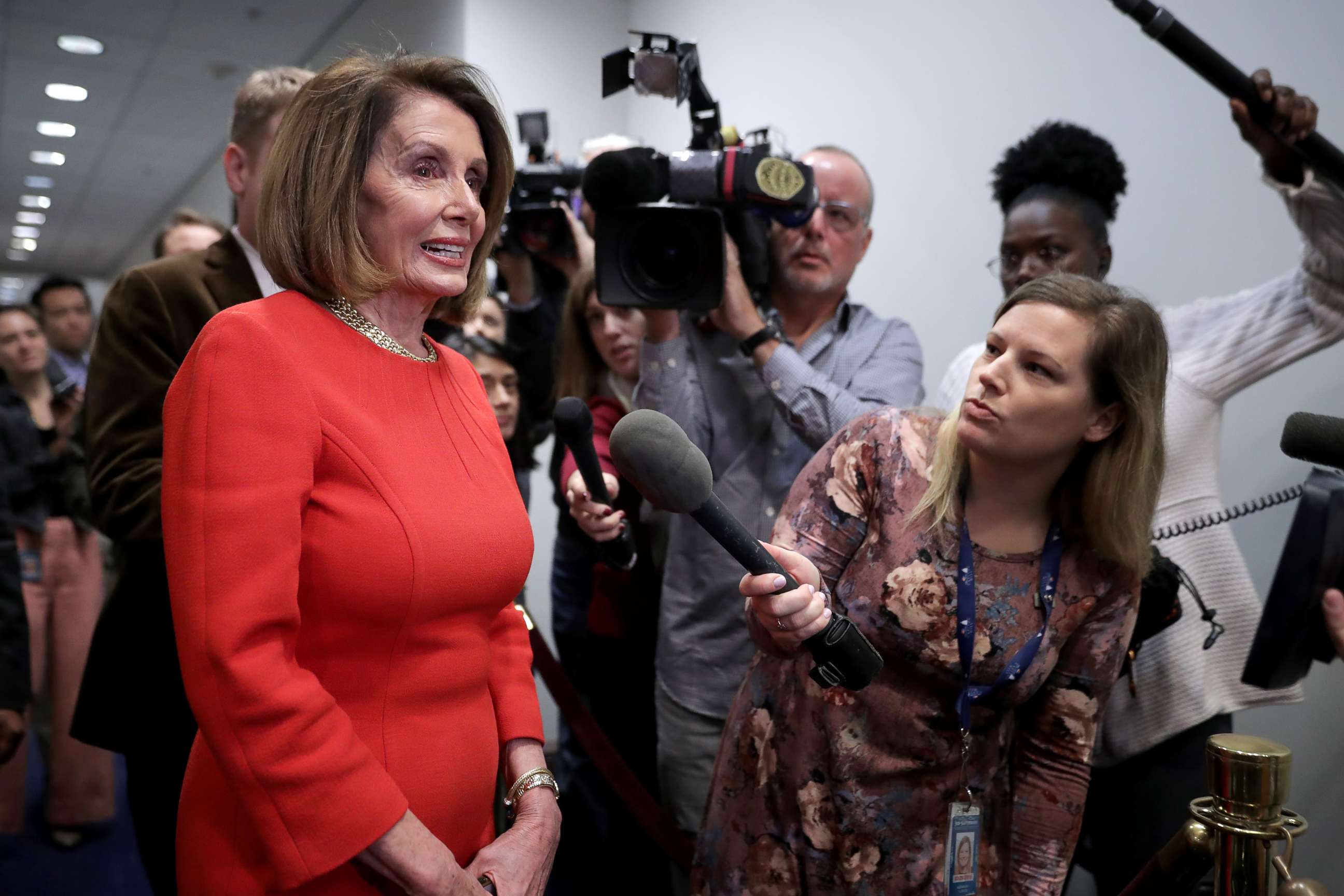 PHOTO: House Minority Leader Nancy Pelosi talks to journalists before heading into a Democratic caucus meeting at the U.S. Capitol Visitors Center, Nov. 14, 2018, in Washington, DC.