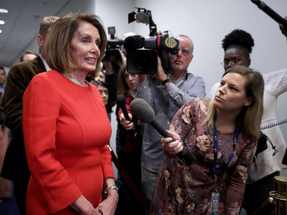 PHOTO: House Minority Leader Nancy Pelosi talks to journalists before heading into a Democratic caucus meeting at the U.S. Capitol Visitors Center, Nov. 14, 2018, in Washington, DC.