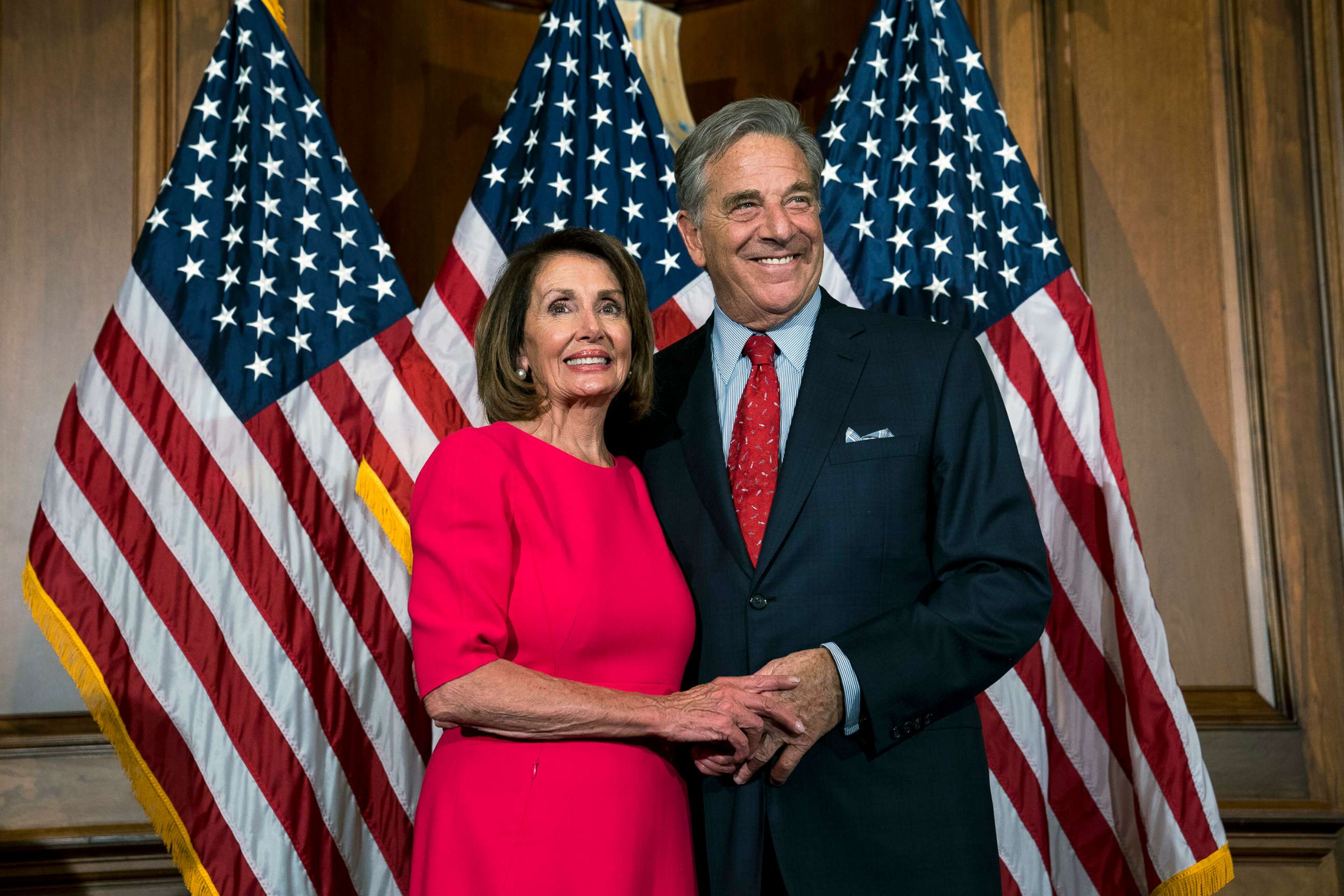PHOTO: In this Jan. 3, 2019, file photo, House Speaker Nancy Pelosi stands with her husband, Paul Pelosi, during the ceremonial swearing-in of the 116th Congress in the Rayburn Room of the U.S. Capitol in Washington, D.C.