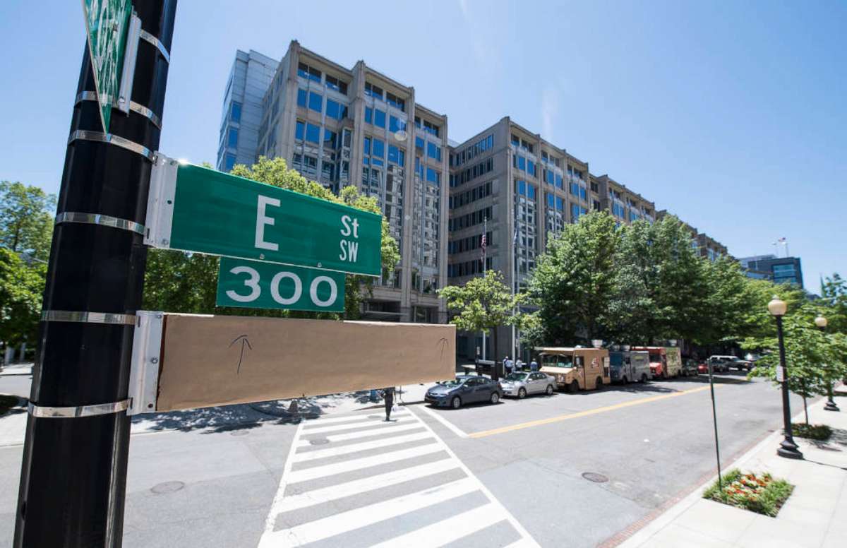 PHOTO: A covered street sign is seen outside of the NASA Headquarters building the day before a street renaming ceremony, June 11, 2019, in Washington, D.C.