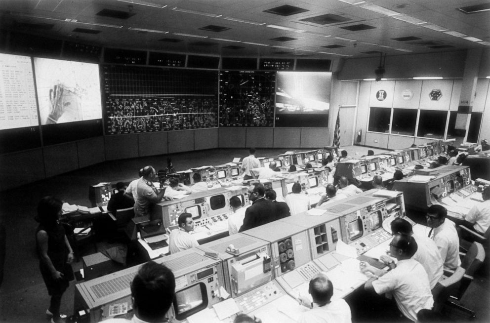 PHOTO: Overall view of the Mission Operations Control Room in the Mission Control Center, bldg 30, during the lunar surface extravehicular activity (EVA) of Apollo 11 Astronauts Neil A. Armstrong and Edwin E. Aldrin Jr.