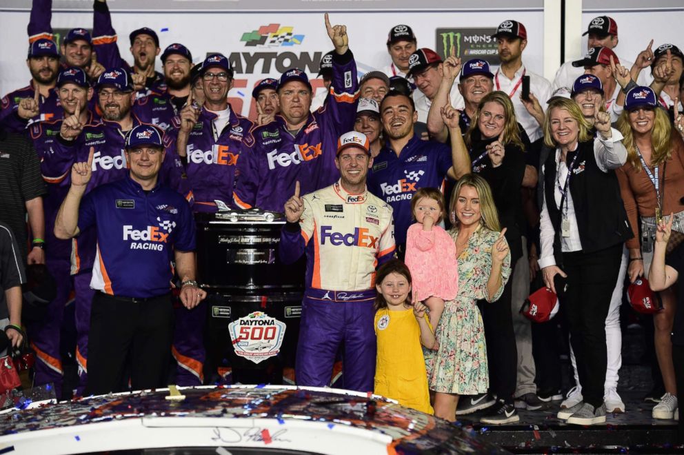 PHOTO: Denny Hamlin, driver of the #11 FedEx Express Toyota, celebrates in victory lane after winning the Monster Energy NASCAR Cup Series 61st Annual Daytona 500 at Daytona International Speedway, Feb. 17, 2019, in Daytona Beach, Fla.