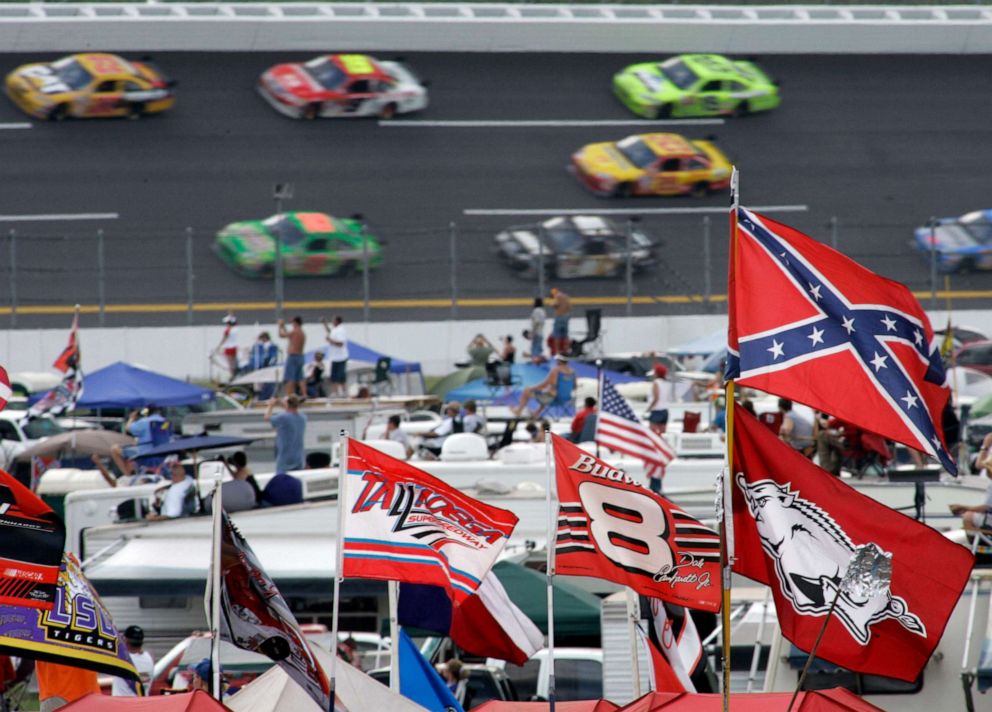 PHOTO:A confederate flag flies in the infield as cars come out of Turn 1 during a NASCAR auto race at Talladega Superspeedway in Talladega, Ala, Oct. 7, 2007.