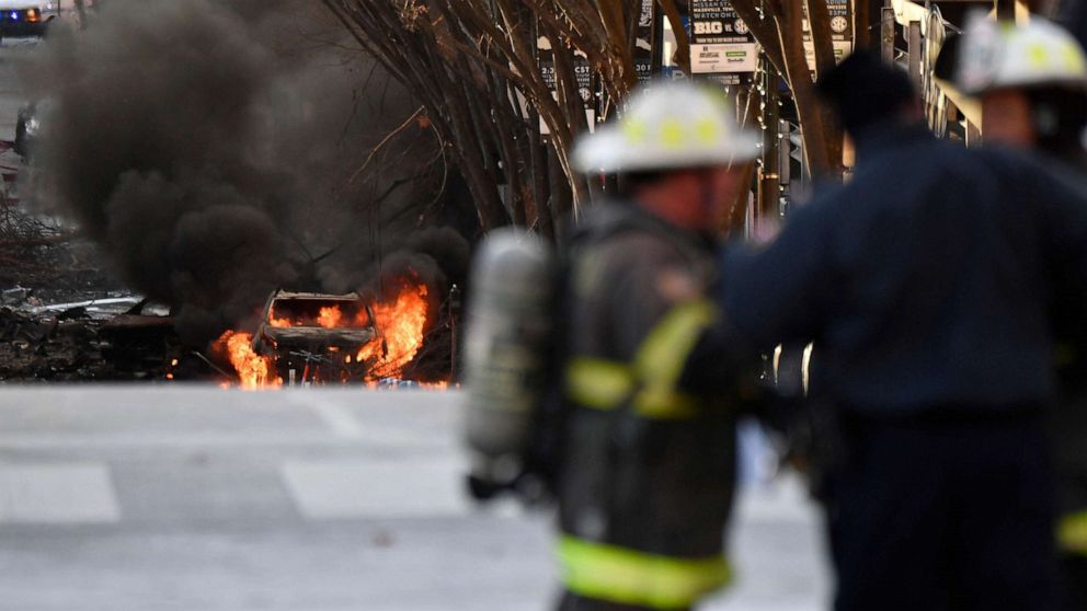 PHOTO: A vehicle burns near the site of an explosion in the area of Second and Commerce in Nashville, Dec. 25, 2020.