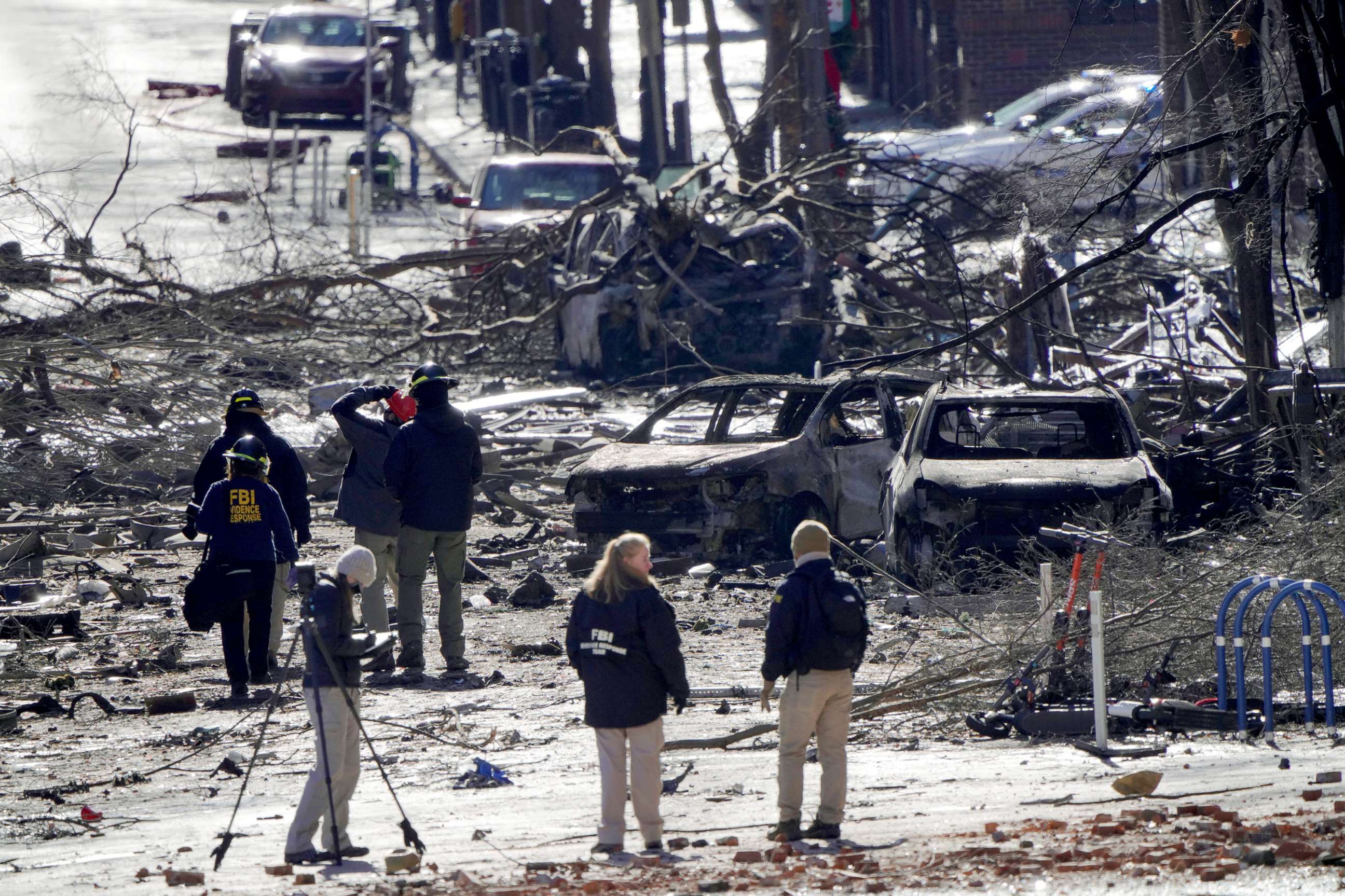 PHOTO: Investigators work near the site of an explosion on 2nd Avenue that occurred the day before in Nashville, Tenn., Dec. 26, 2020.