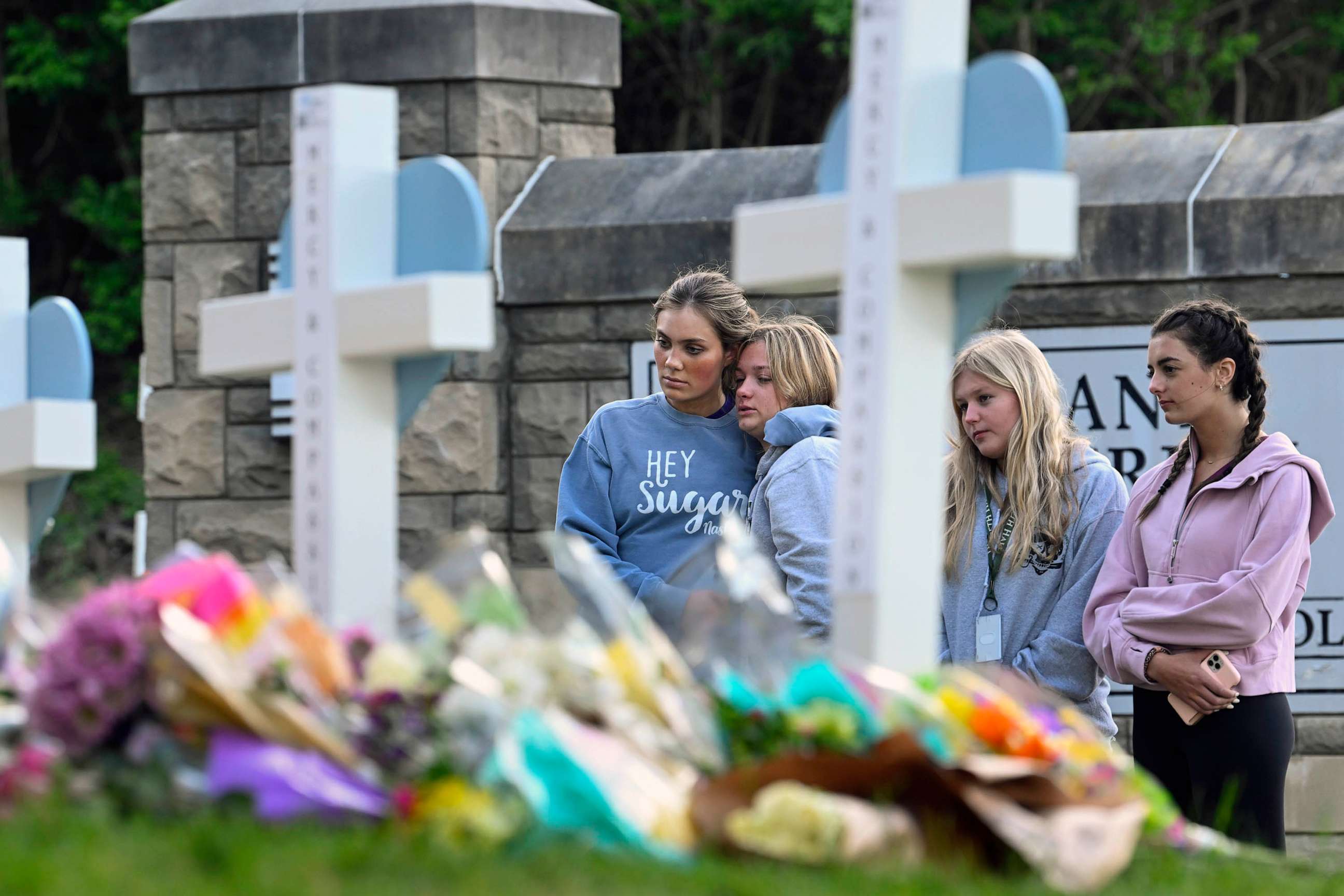PHOTO: FILE - Students at a nearby school pay respects at a memorial for the people who were killed, at an entry to Covenant School, March 28, 2023, in Nashville, Tenn.