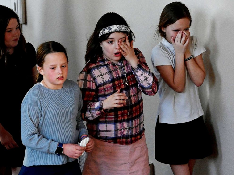PHOTO: A group of girls leave after a prayer vigil at Woodmont Christian Church for victims of the mass shooting at Covenant School in Nashville, Tenn., March 27, 2023.