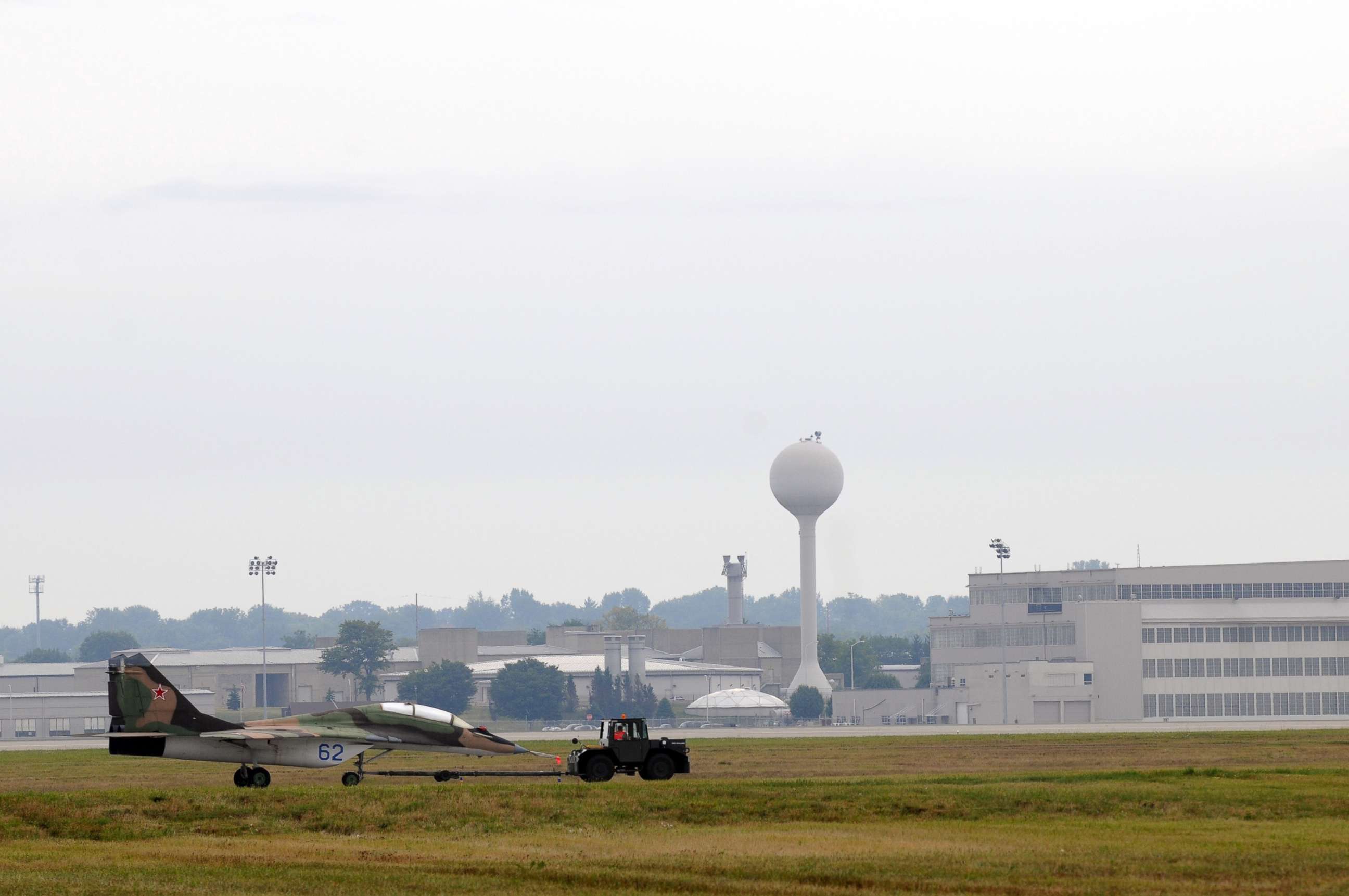 PHOTO: A MiG 29UB FULCRUM B belonging to the National Air and Space Intelligence Center is towed across the flightline. The MiG is returning as a static display outside of NASIC now that the IPC construction is complete.