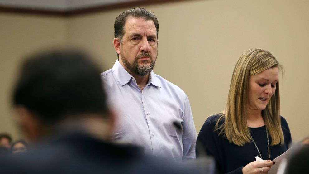 Thomas Brennan, a mentor and coach to former athlete Gwen Anderson, looks at Larry Nassar while Anderson speaks of Nassar's sexual assaults in Circuit Judge Rosemarie Aquilina's courtroom during the second day of victim impact statements regarding former sports medicine doctor Larry Nassar, Jan. 17, 2018. 