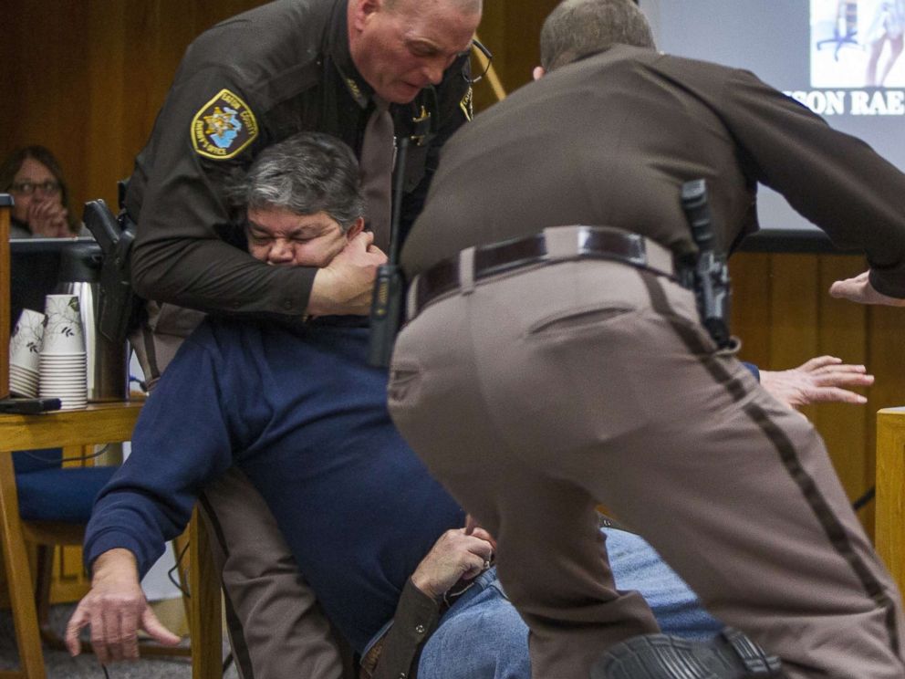 PHOTO: Eaton County Sheriff's deputies restrain Randall Margraves, father of three victims of Larry Nassar, Feb. 2, 2018, in Eaton County Circuit Court in Charlotte, Mich.