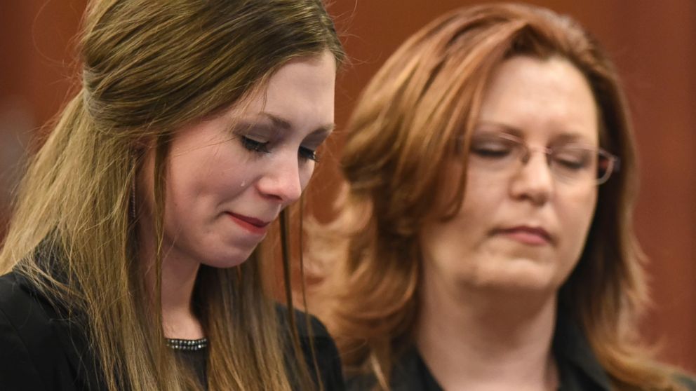 Dancer Jessica Smith and her mother Kimberly listen as Circuit Judge Rosemarie Aquilina speaks during the third day of victim impact statements in the trial of doctor Larry Nassar, in Lansing, Mich., Jan. 18, 2018.