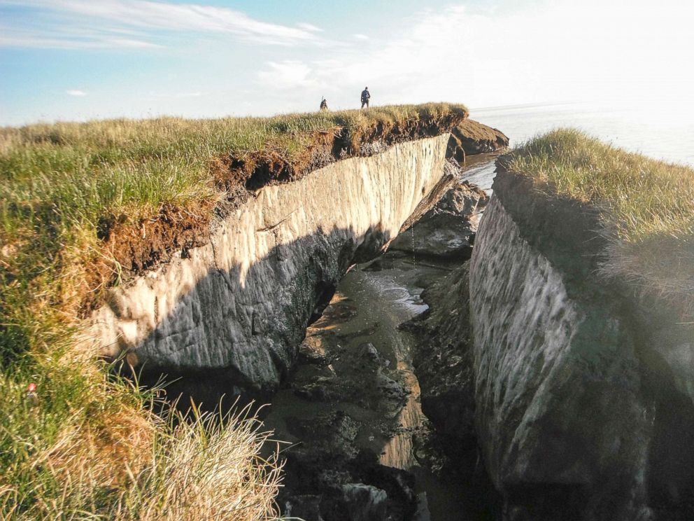 PHOTO: Ice-rich permafrost has been exposed due to coastal erosion a the National Petroleum Reserve in Alaska in 2014.