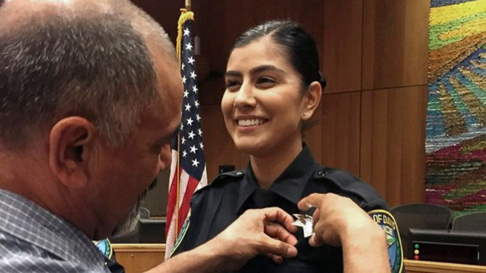 PHOTO: Merced Corona, left, pins his daughter Natalie Corona's badge on her uniform during a swearing-in ceremony in Davis, Calif., Aug. 2, 2018. Natalie Corona was shot and killed during a routine call on Jan. 10, 2019.