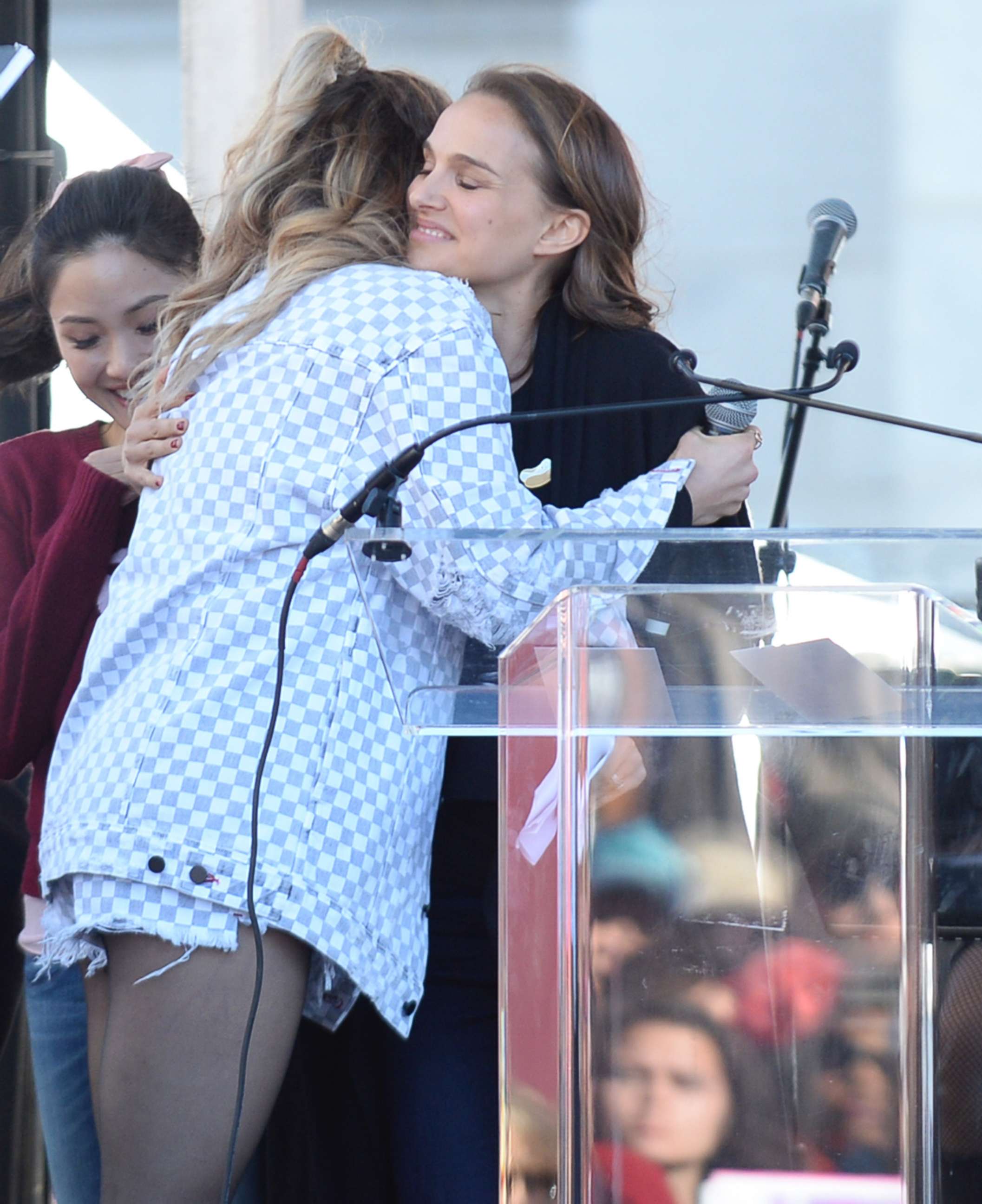 PHOTO: Natalie Portman, right, being hugged by and Rachel Platten at the Women's March and rally in Los Angeles, Calif., Jan. 20, 2018.