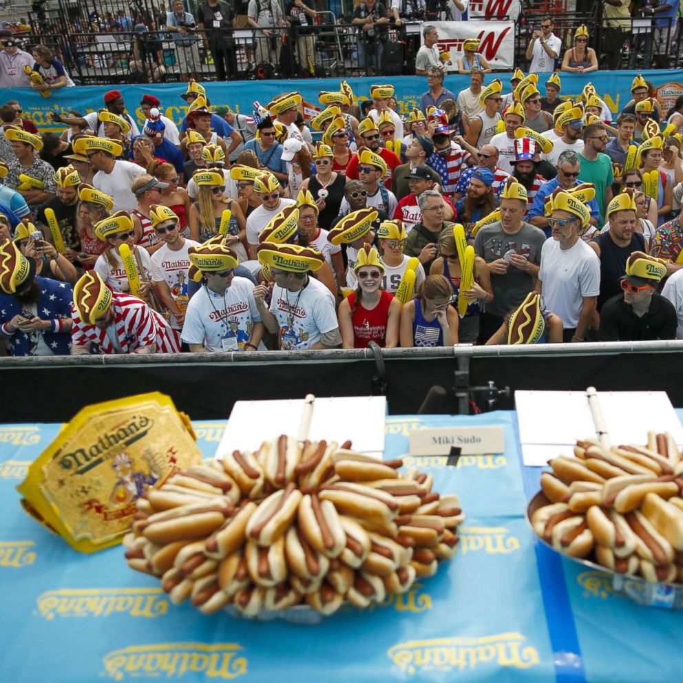 pix Coney Island Hot Dog Eating Contest Record joey jaws chestnut gobbles 74 hotdogs setting new world record