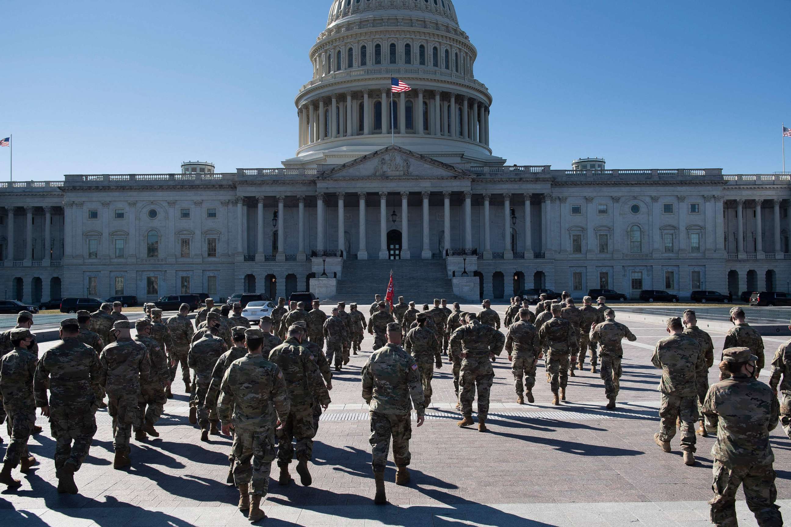 PHOTO: Members of the National Guard are seen on the east front of the U.S. Capitol building on Capitol Hill in Washington, D.C., on March 2, 2021.