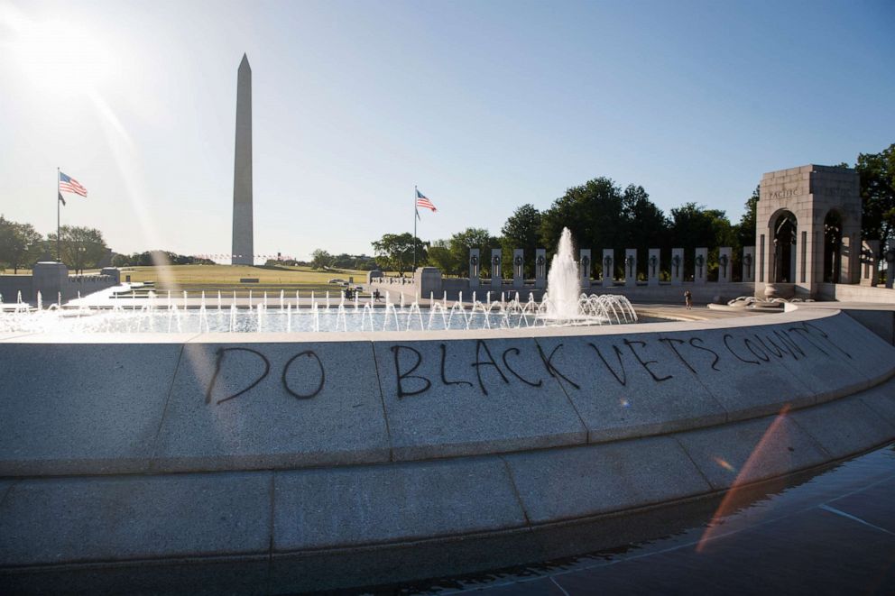 PHOTO: Spray paint that reads "Do Black Vets Count?" is seen World War II Memorial on the National Mall in Washington, May 31, 2020, the morning after protests over the death of George Floyd.