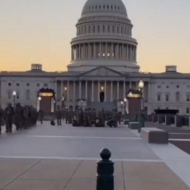 Hundreds of National Guard troops are seen in sped-up footage taken in front of the Capitol building, ahead of President-elect Joe Biden's inauguration.