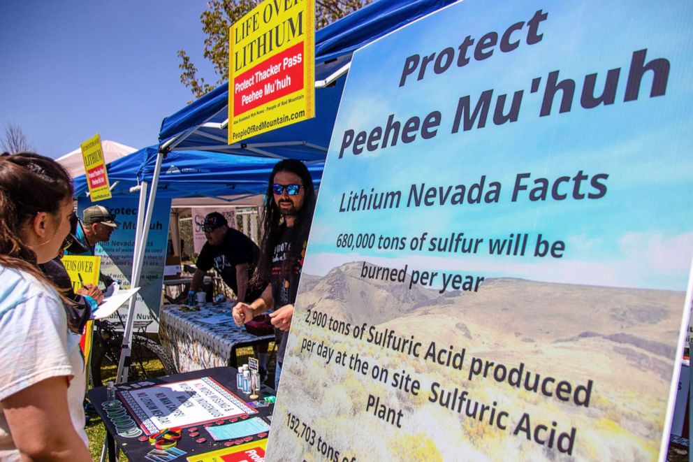 PHOTO: A Native American group protests a mine at an Earth Day event in a public park in Reno, April 24, 2022.