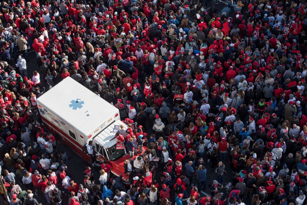 PHOTO: A parked ambulance is surrounded by fans as the MLB Washington Nationals celebrate the team's World Series baseball championship over the Houston Astros, in Washington, Saturday, Nov. 2, 2019.