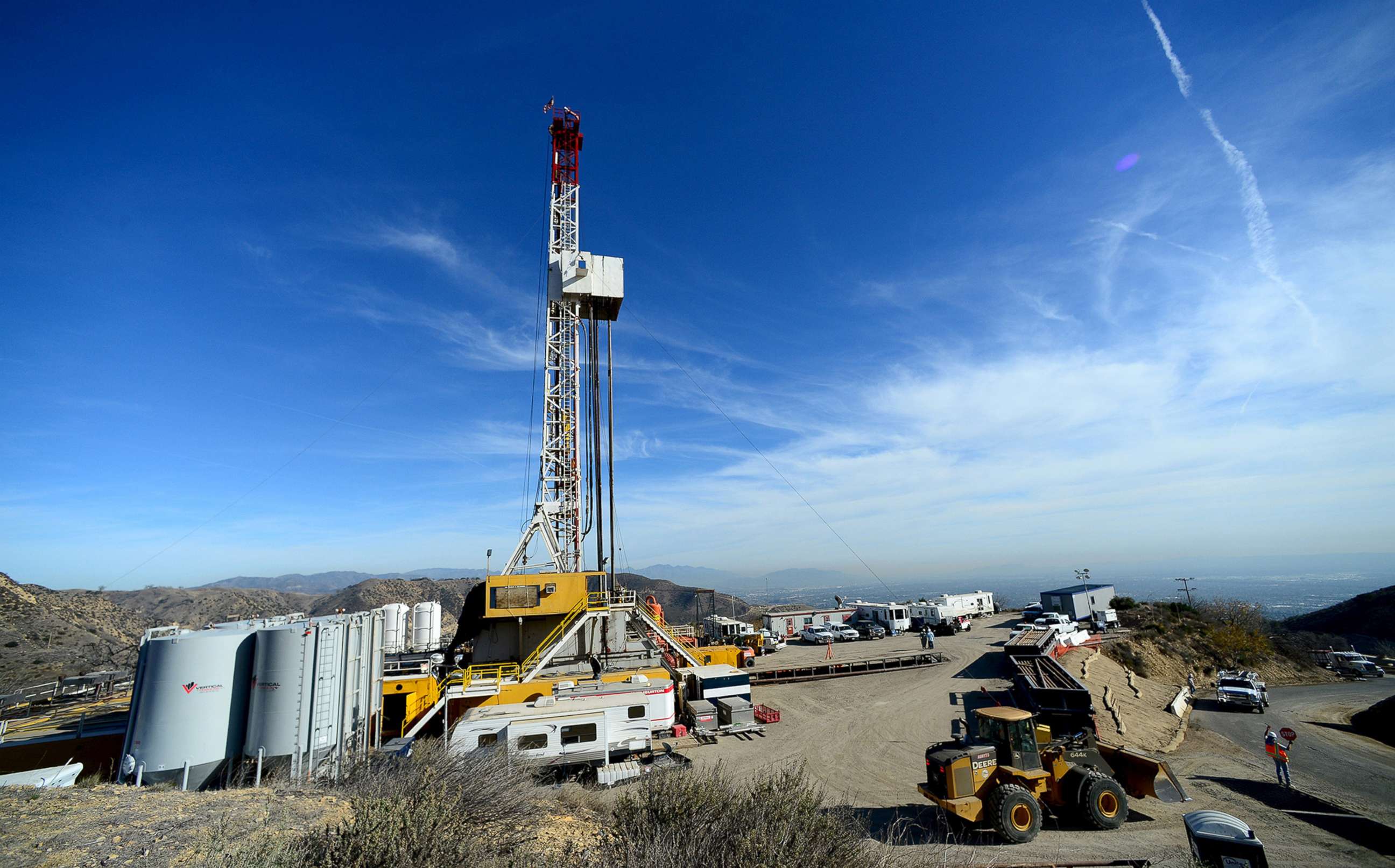 PHOTO: Crews from Southern California Gas Company and outside experts work on a relief well at the Aliso Canyon gas field above the Porter Ranch section of northwest Los Angeles, California in this December 9, 2015, file photo.