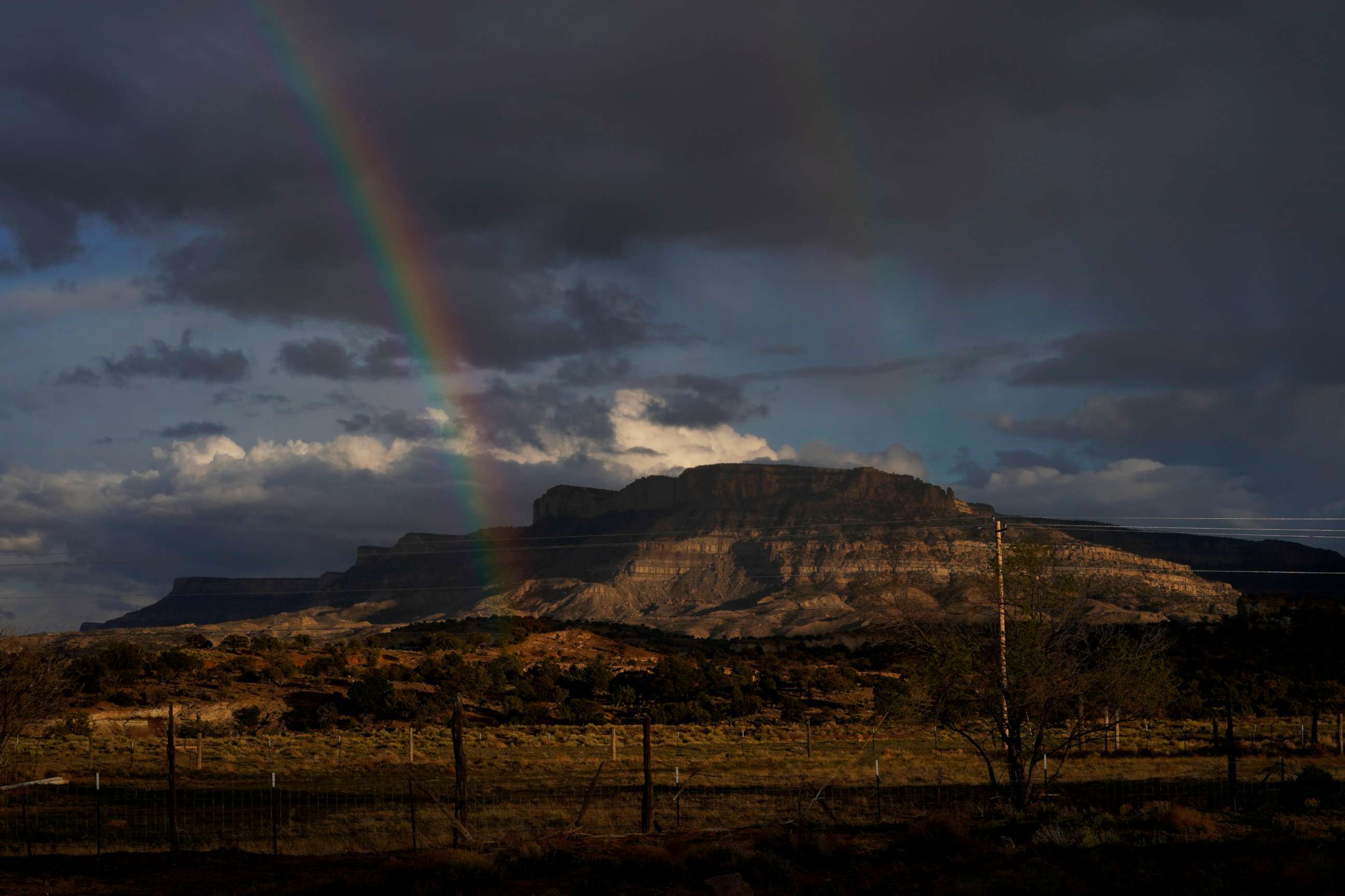 PHOTO: A rainbow is seen in the distance from the closed Chilchinbeto Church of the Nazarene in Chilchinbeto, Ariz., on the Navajo reservation on April 21, 2020.