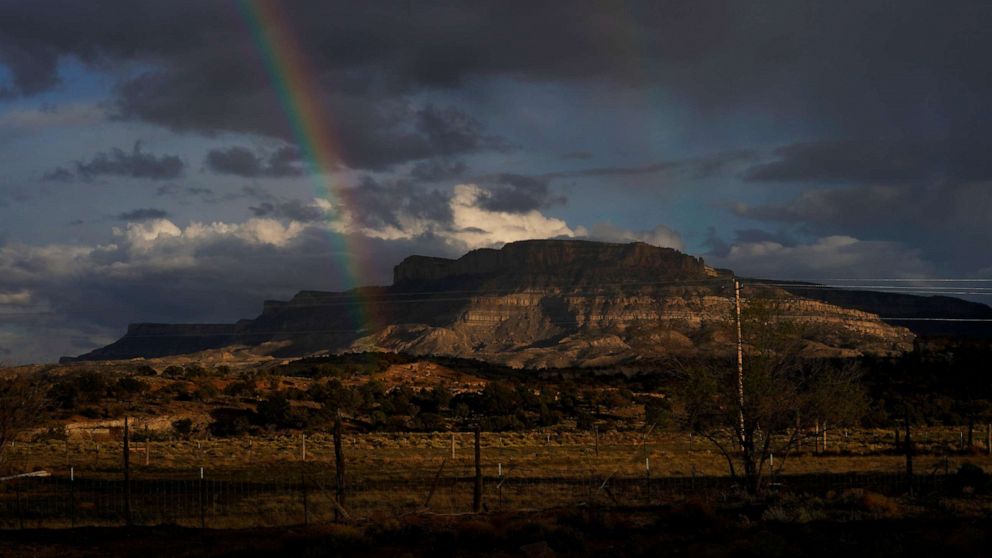 PHOTO: A rainbow is seen in the distance from the closed Chilchinbeto Church of the Nazarene in Chilchinbeto, Ariz., on the Navajo reservation on April 21, 2020.