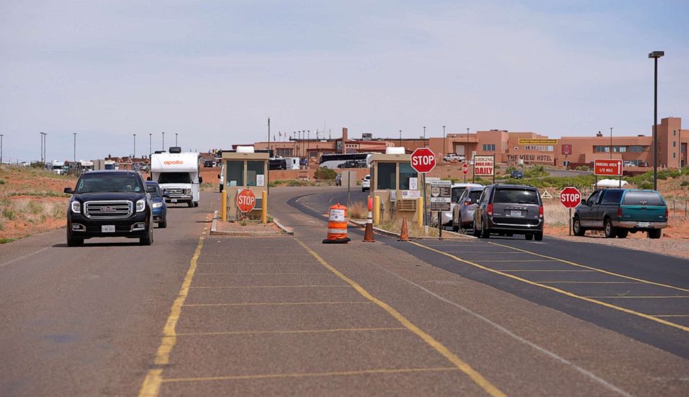 PHOTO: Visitors enter and exit Monument Valley Navajo Tribal Park on June 12, 2019 in Monument Valley, Ariz.