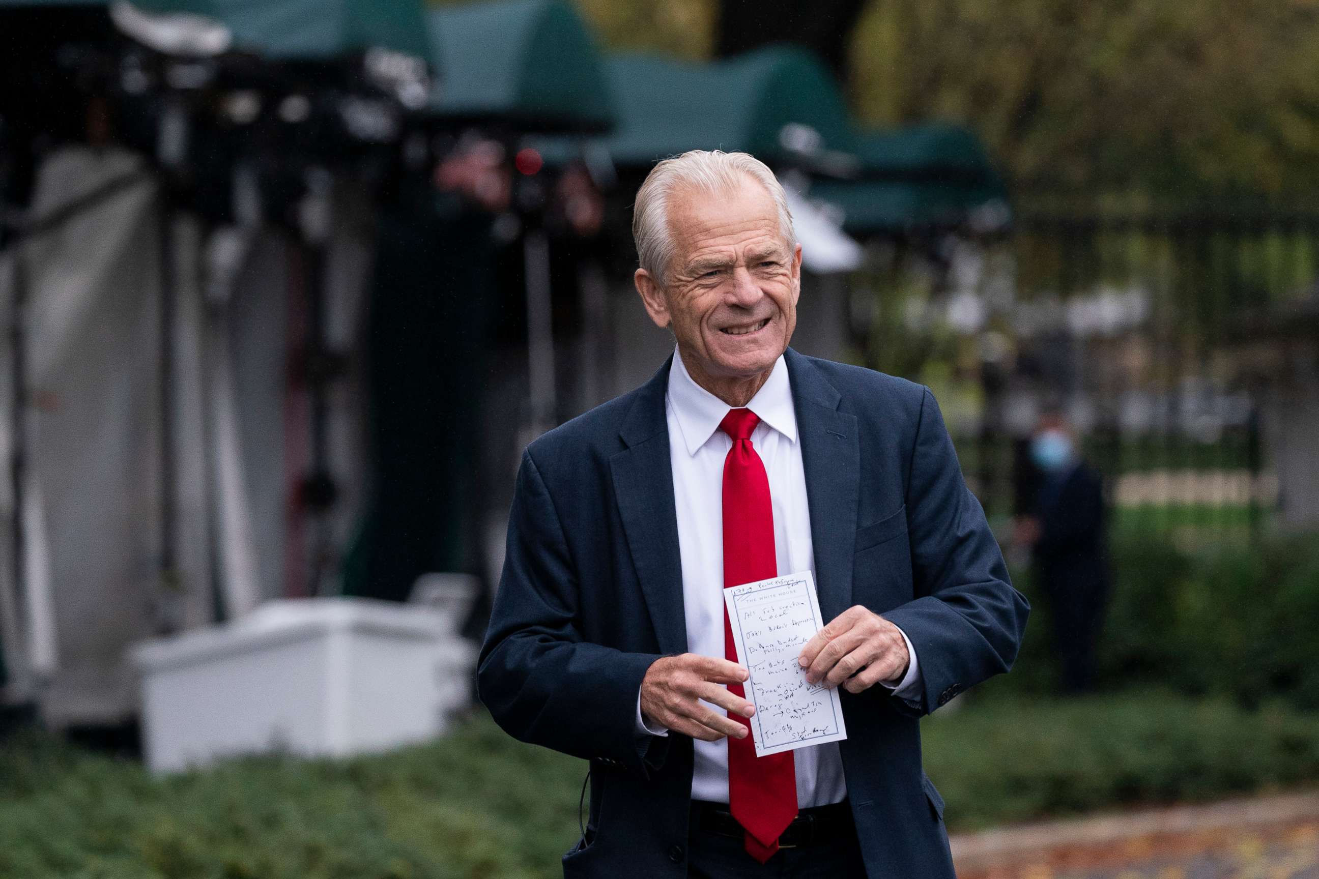 PHOTO: White House trade adviser Peter Navarro holds his notes after a television interview at the White House, Oct. 12, 2020, in Washington.