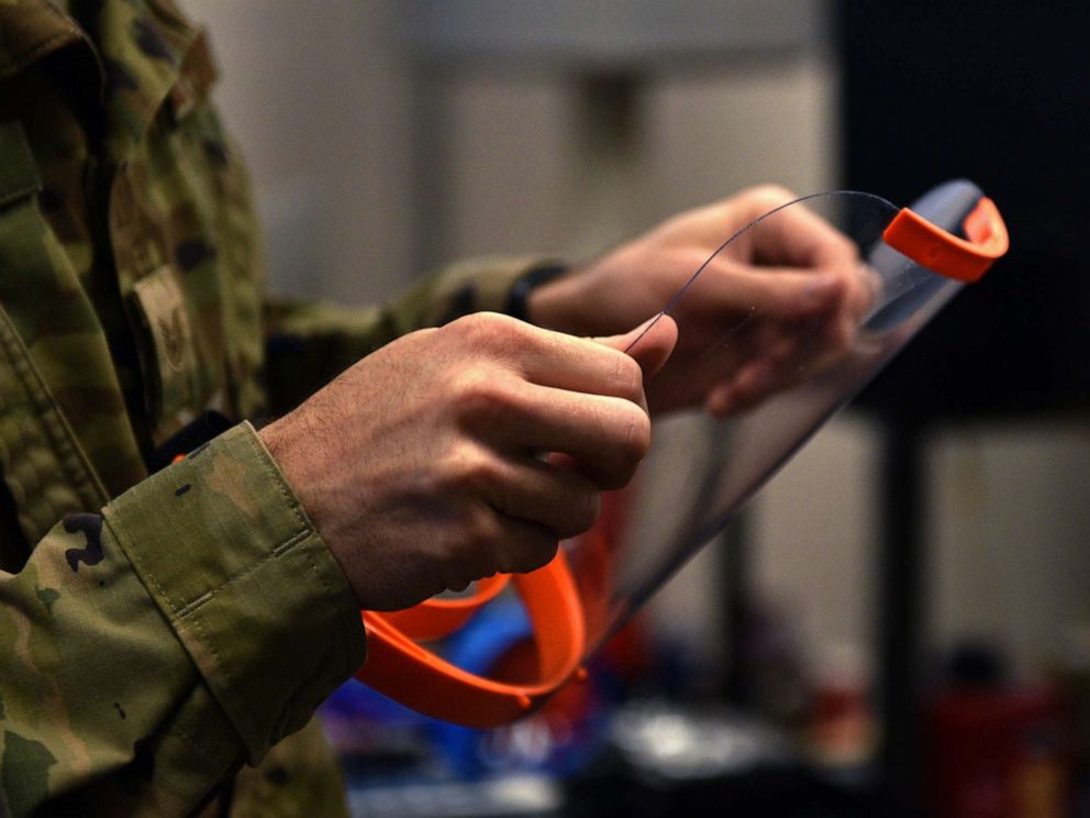 PHOTO: Staff Sgt. Jonathan Bahr, 312th Training Squadron Special Instruments Training course instructor, prepares a 3D printed face shield at the Louis F Garland Department of Defense Fire Academy on Goodfellow Air Force Base, Texas, March 31, 2020.
